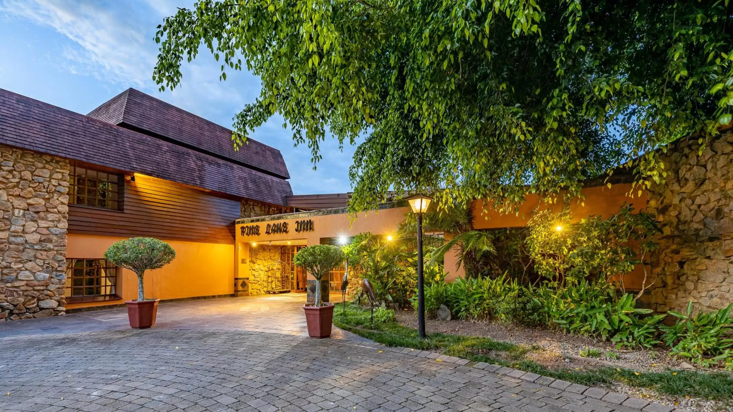 Property building in African Sky Hotels - Pine Lake Inn Property building in African Sky Hotels - Pine Lake Inn