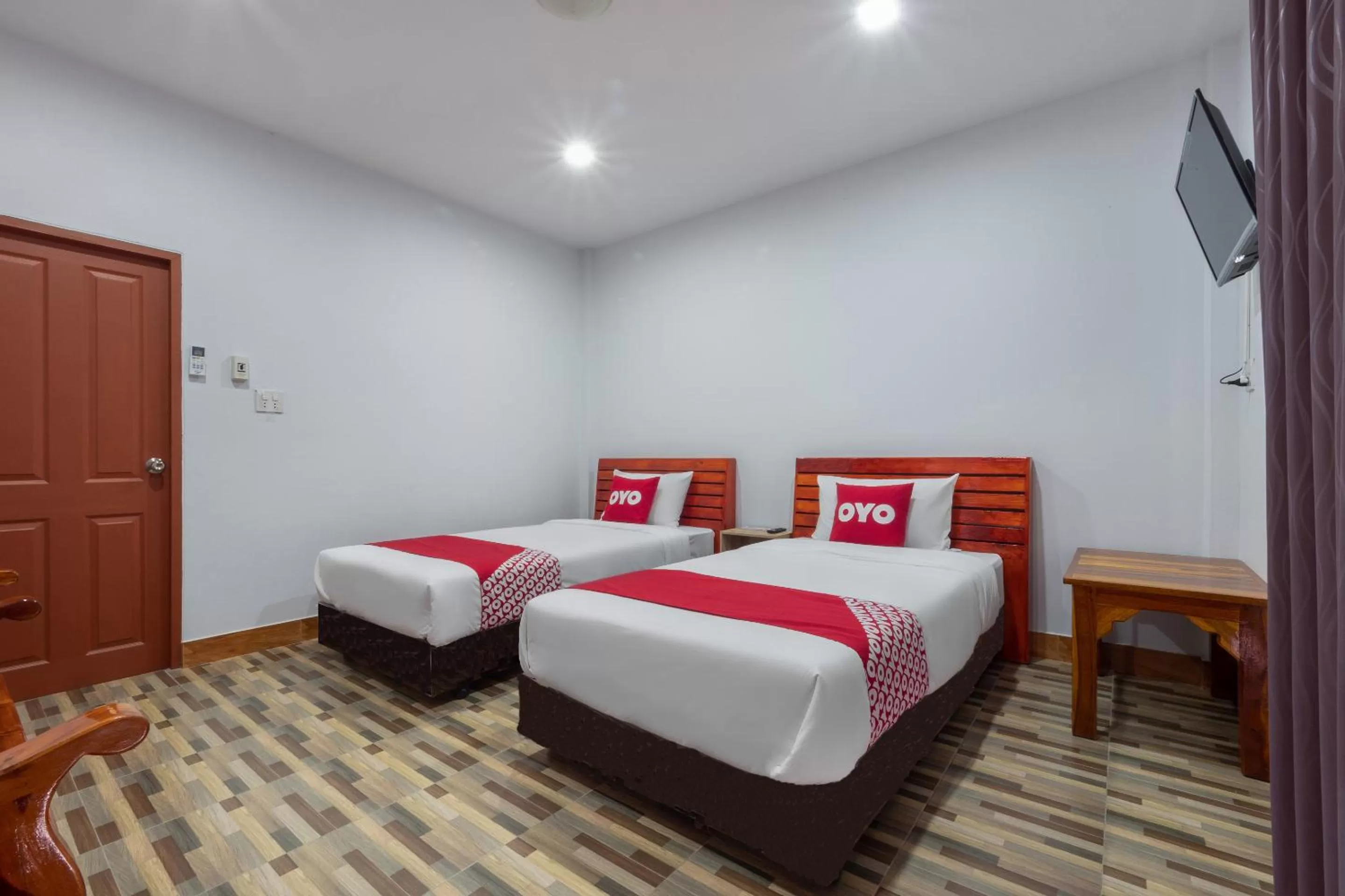 Bedroom, Bed in OYO 1044 Vassana Resort