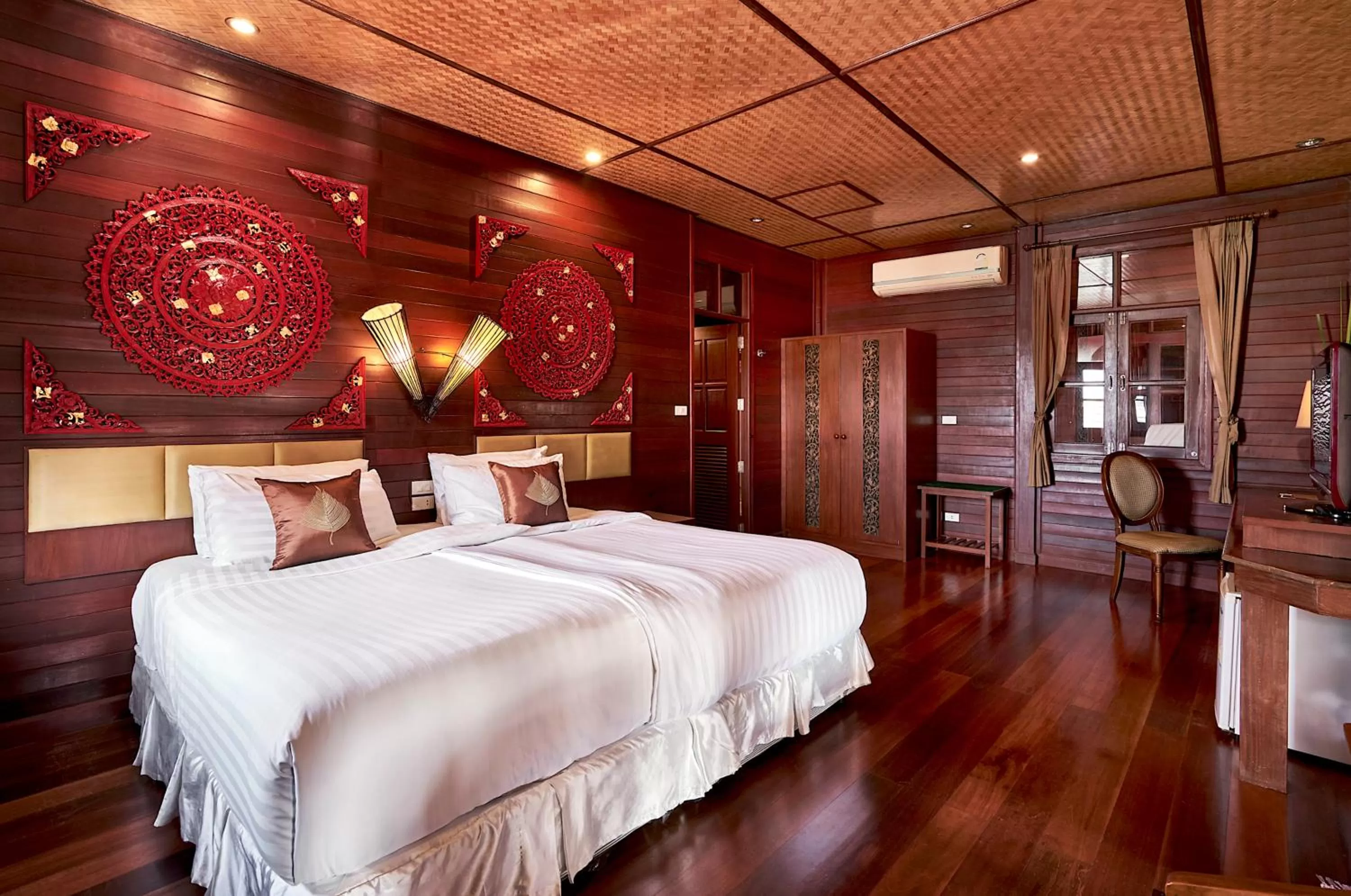 Bed in Ruenkanok Thaihouse Resort