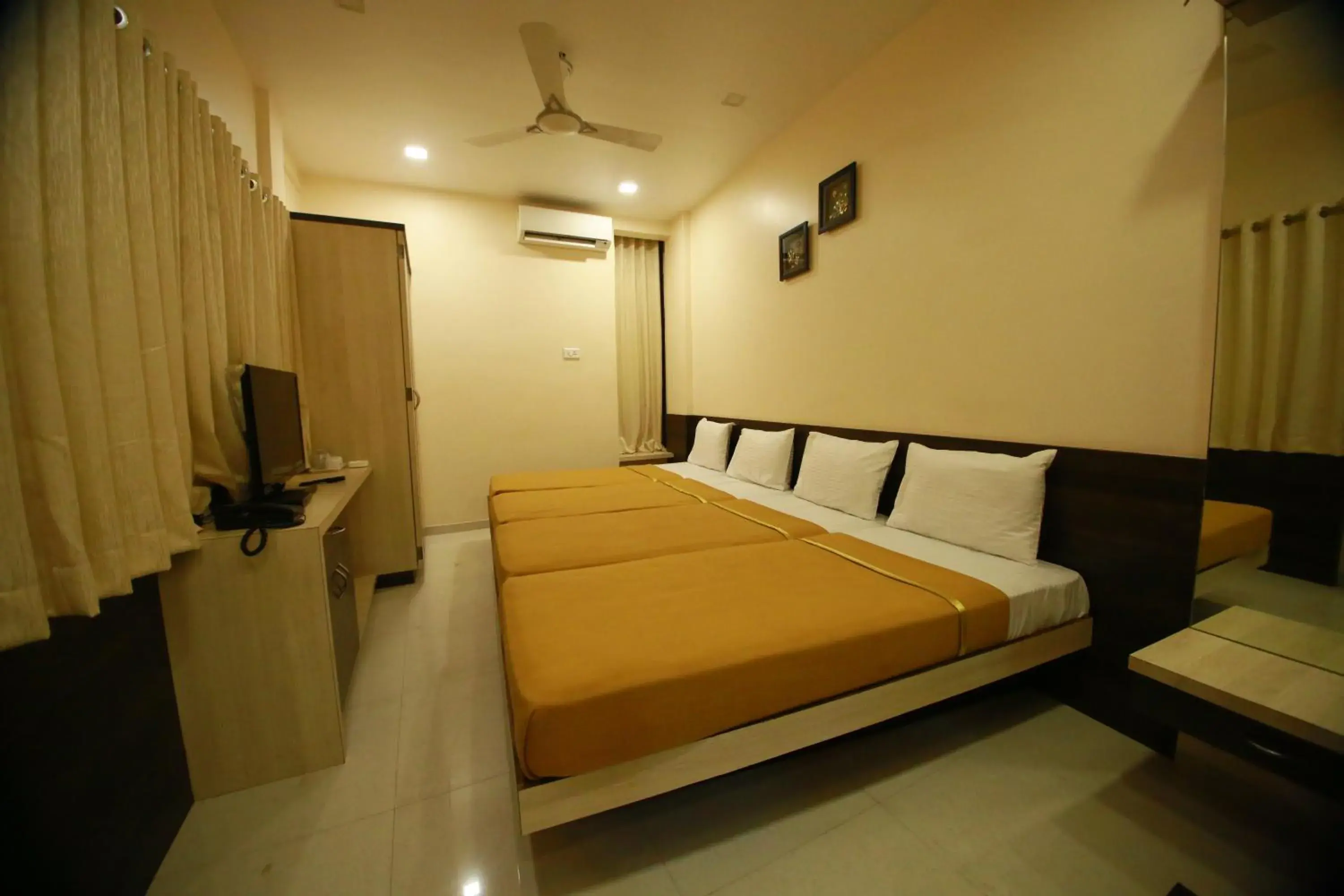 Bedroom in Hotel Madhuri Executive