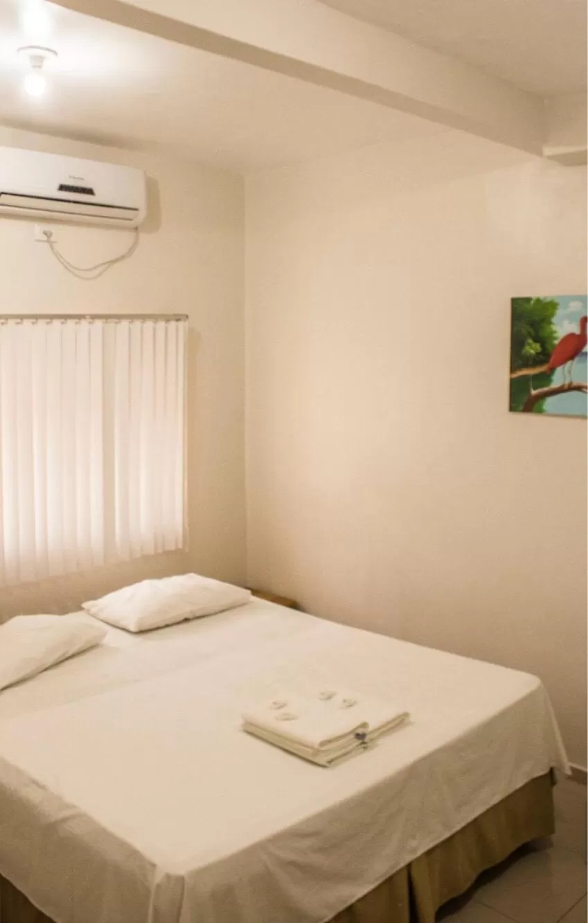 Bed in Pousada Vila do Carmo