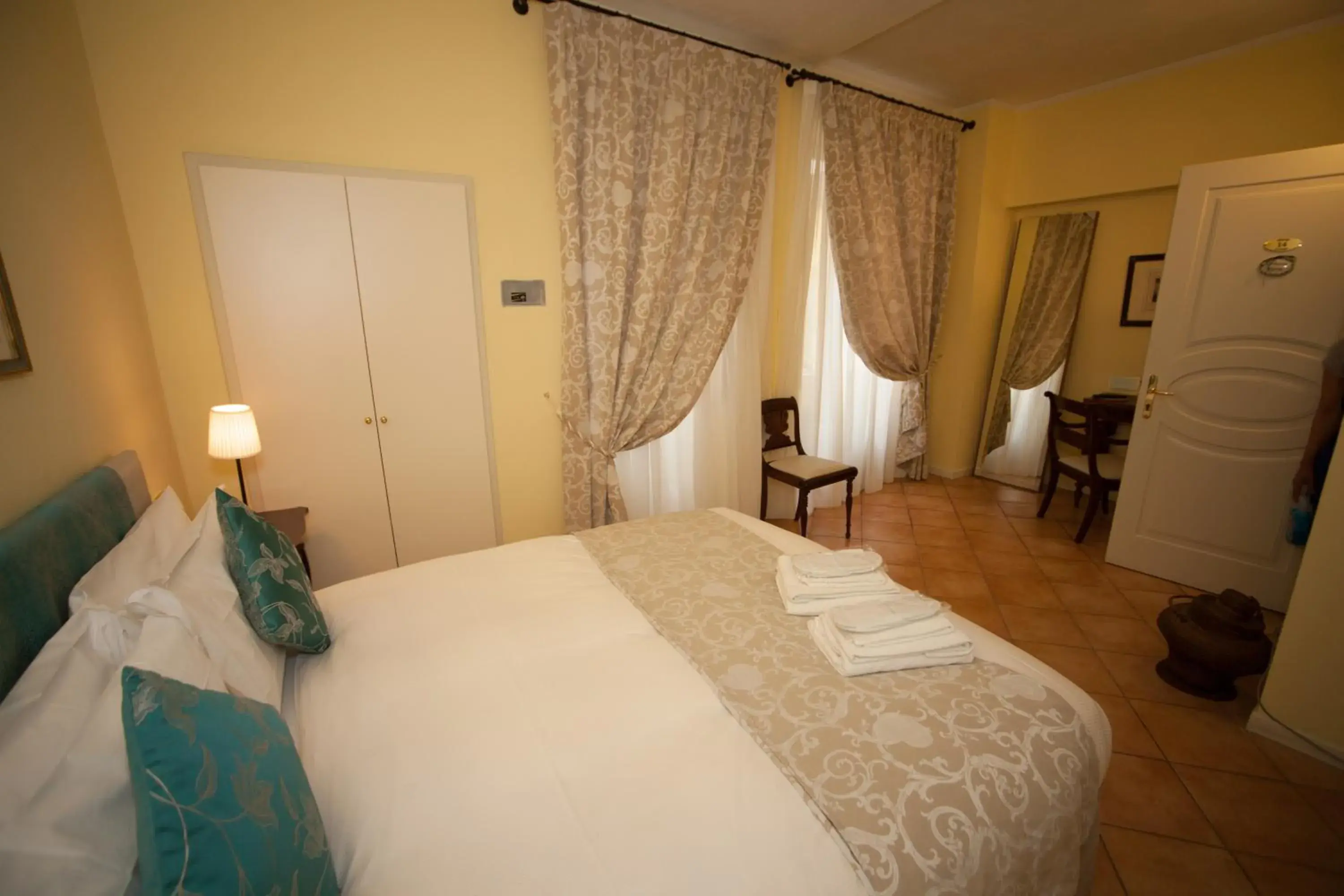 Photo of the whole room, Bed in Albergo Orologio