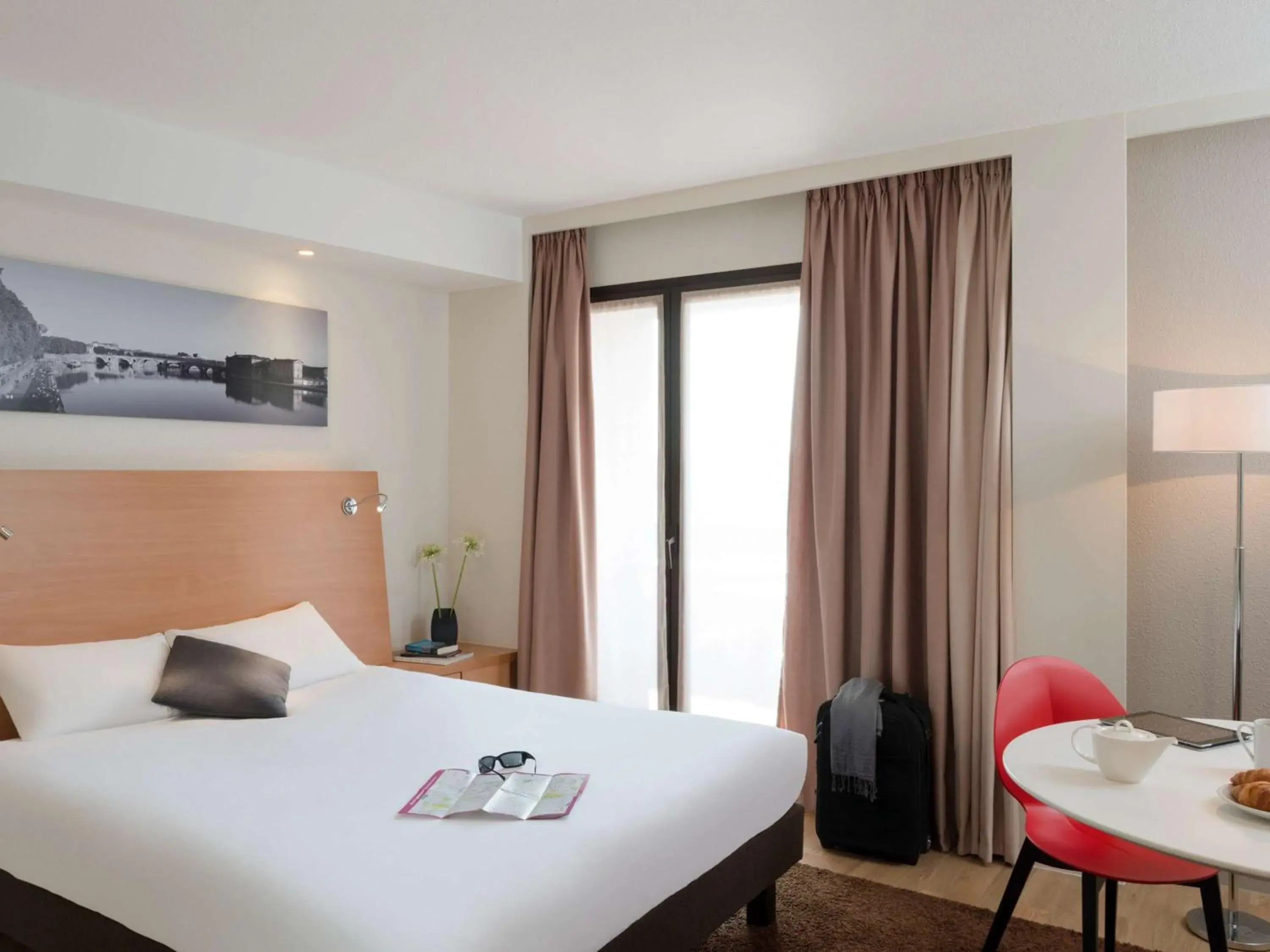 Photo of the whole room, Bed in Aparthotel Adagio Toulouse Centre Ramblas