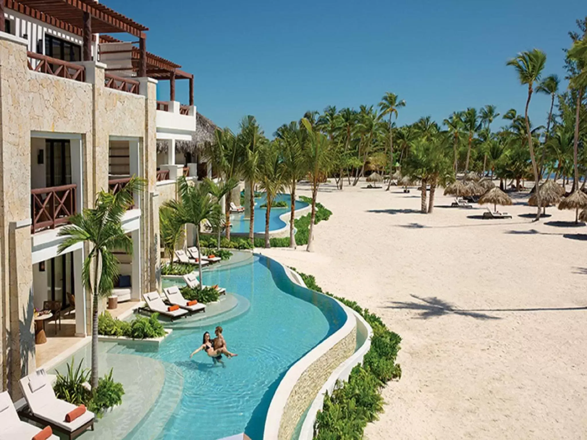 Swimming pool in Secrets Cap Cana Resort & Spa - Adults Only - All Inclusive Swimming pool in Secrets Cap Cana Resort & Spa - Adults Only - All Inclusive