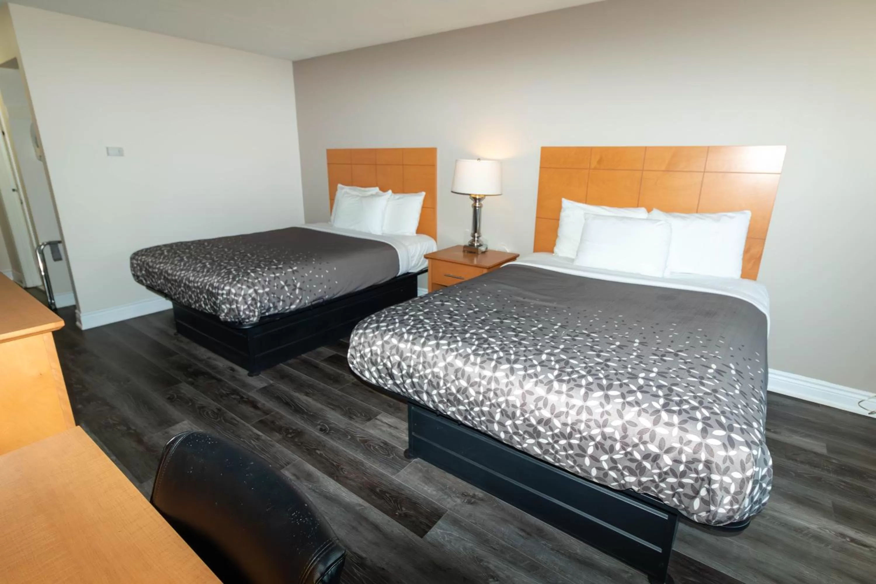 Bed in Borden Inn and Suites