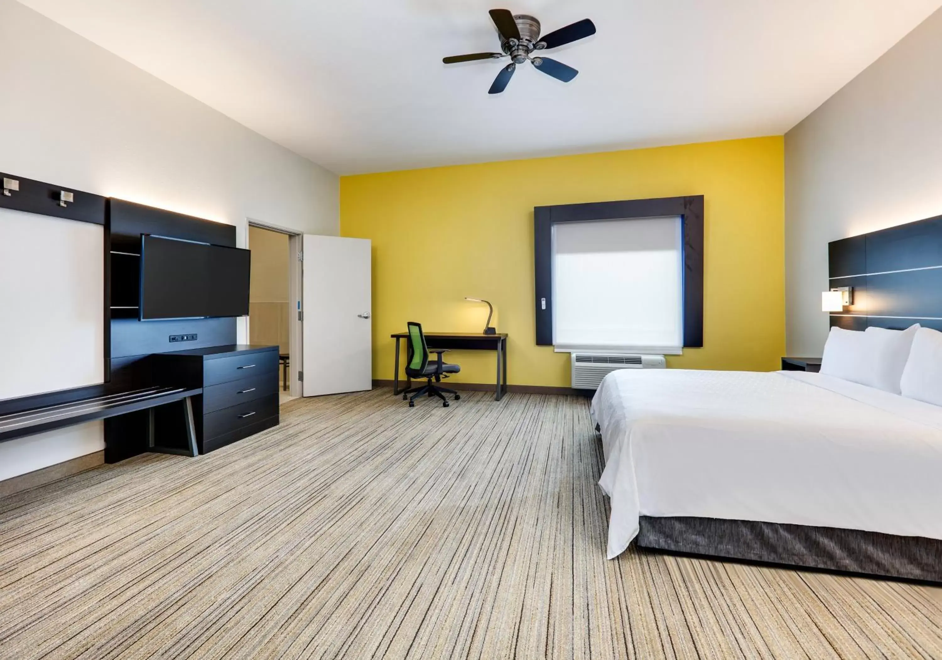 Photo of the whole room, TV/Entertainment Center in Holiday Inn Express Hotel & Suites Cleburne, an IHG Hotel