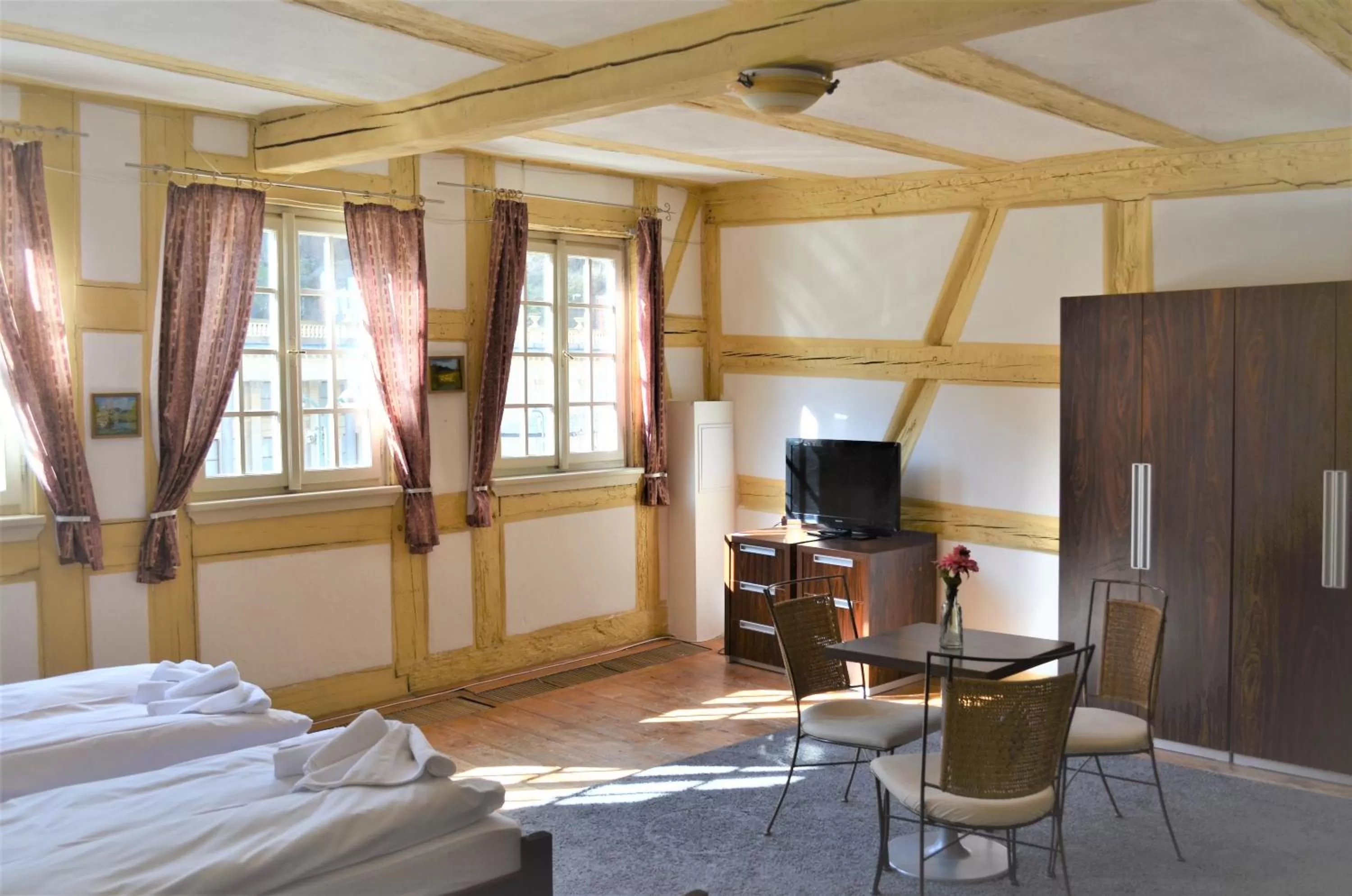 Seating area, Bed in Hotel Petr