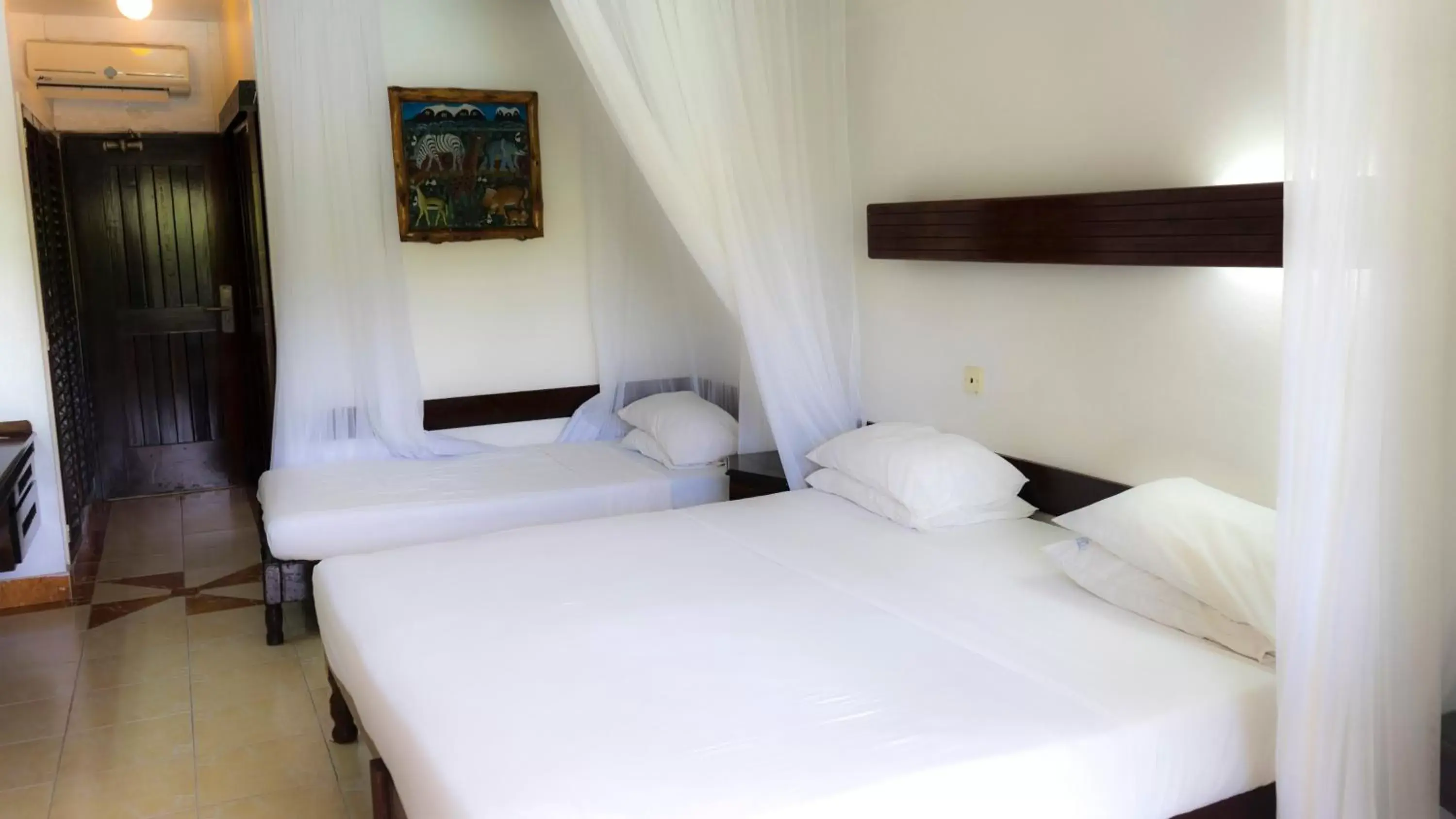 Photo of the whole room, Bed in Reef Hotel Mombasa