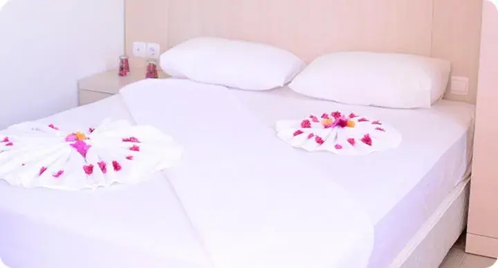 Bed in Parus Hotel