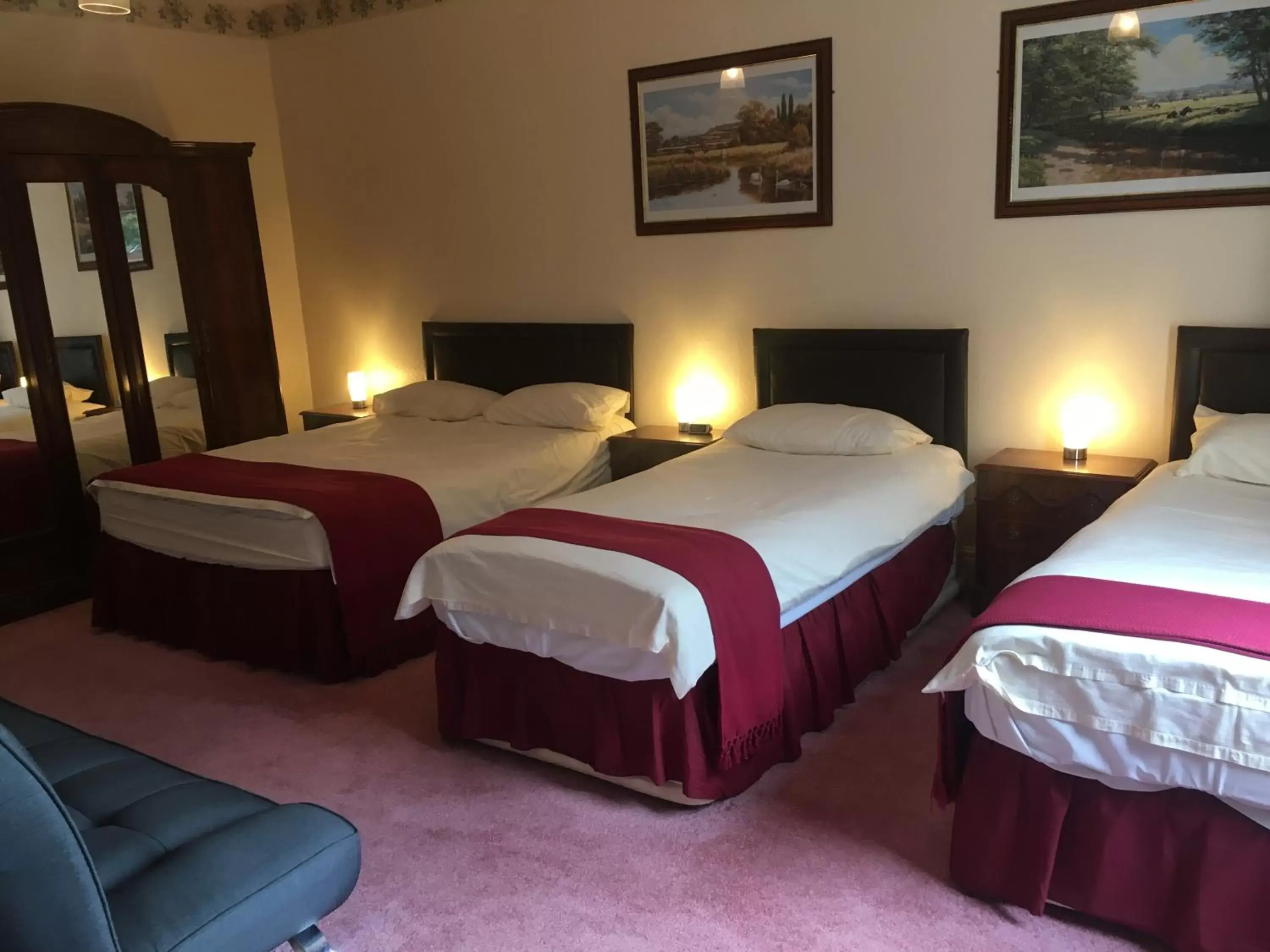 Bed in Holly Trees Hotel