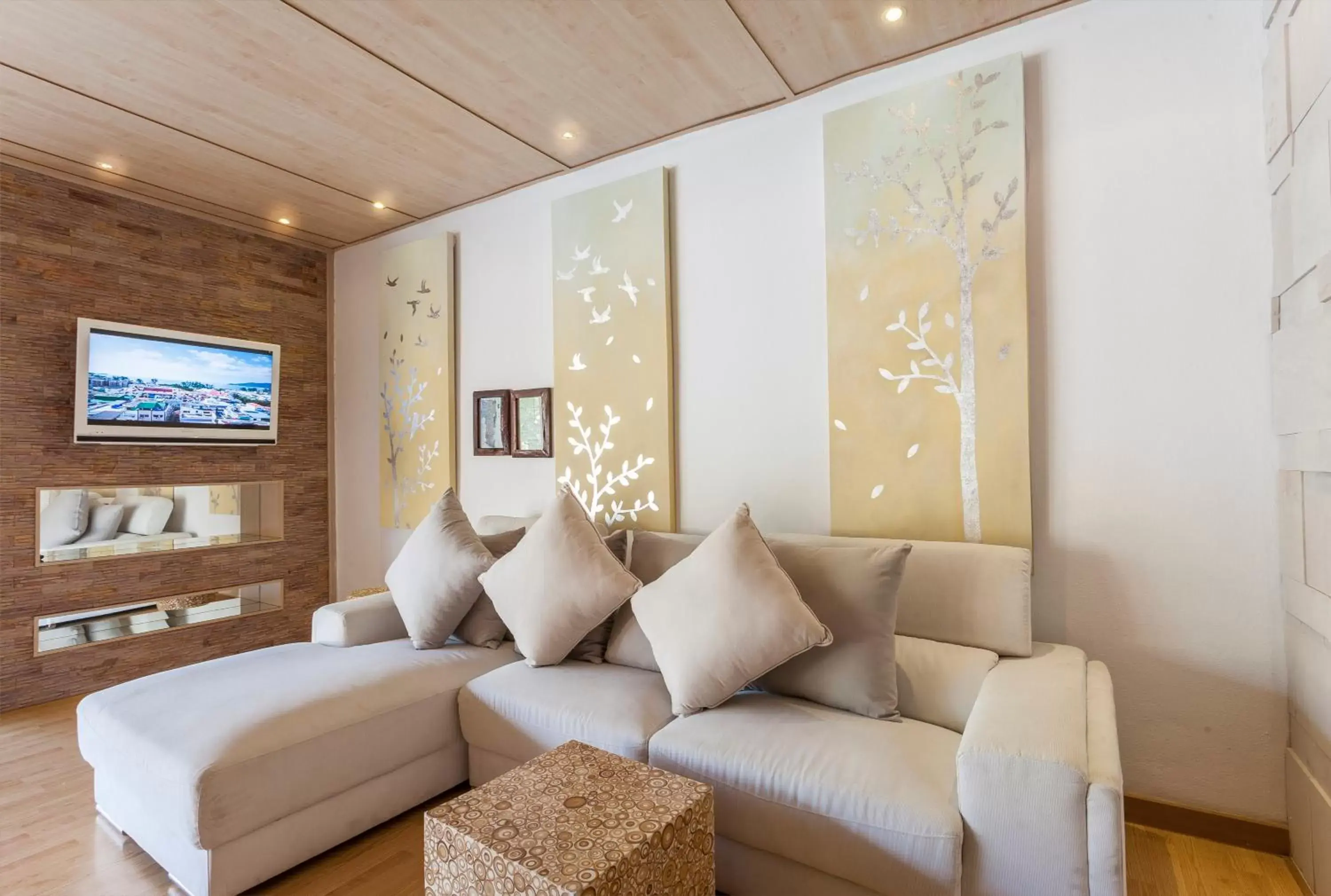 Living room in Dhevan Dara Resort & Spa Hua Hin - Pool Villa Living room in Dhevan Dara Resort & Spa Hua Hin - Pool Villa