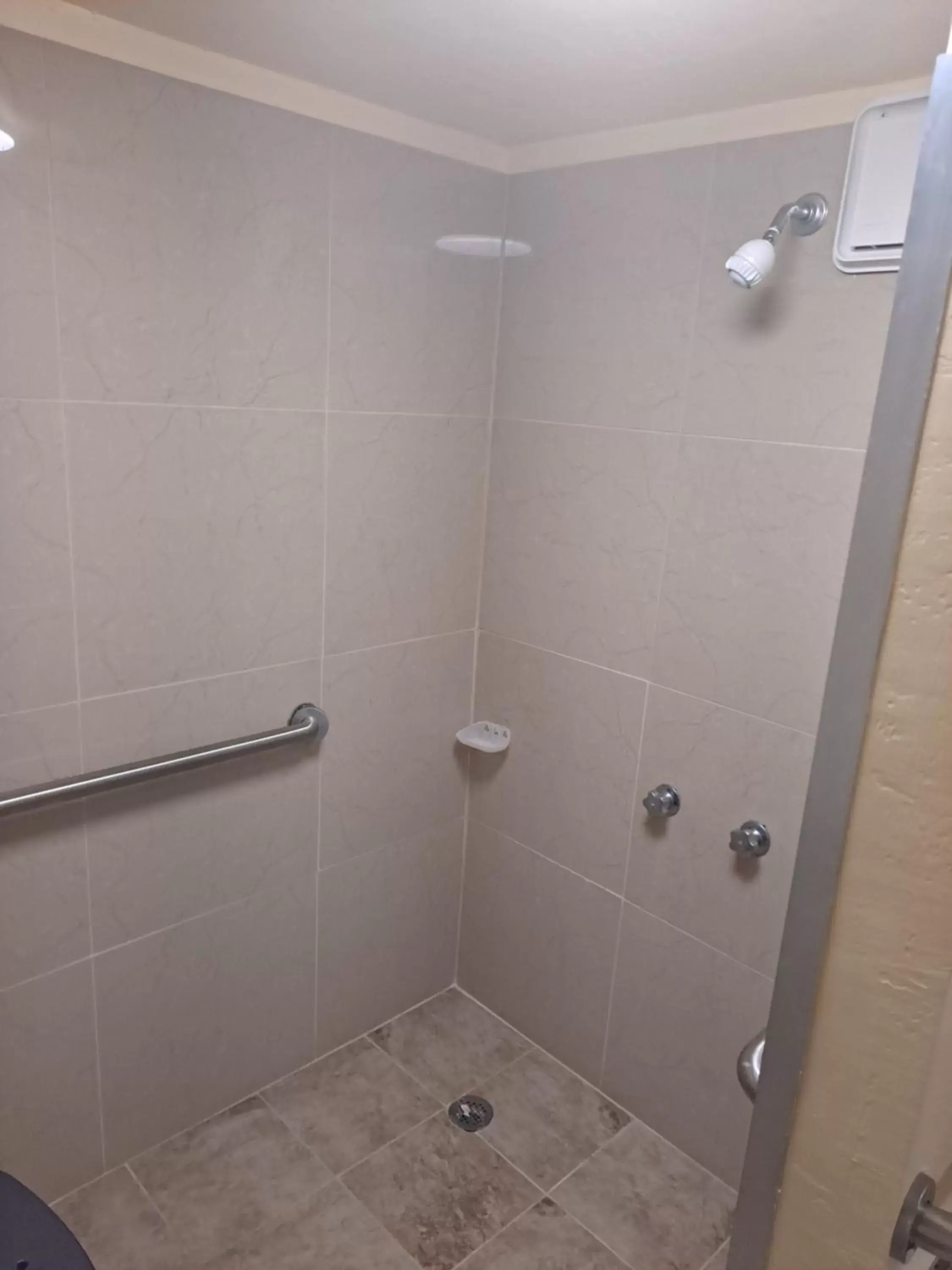 Bathroom in Days Inn by Wyndham Gainesville University