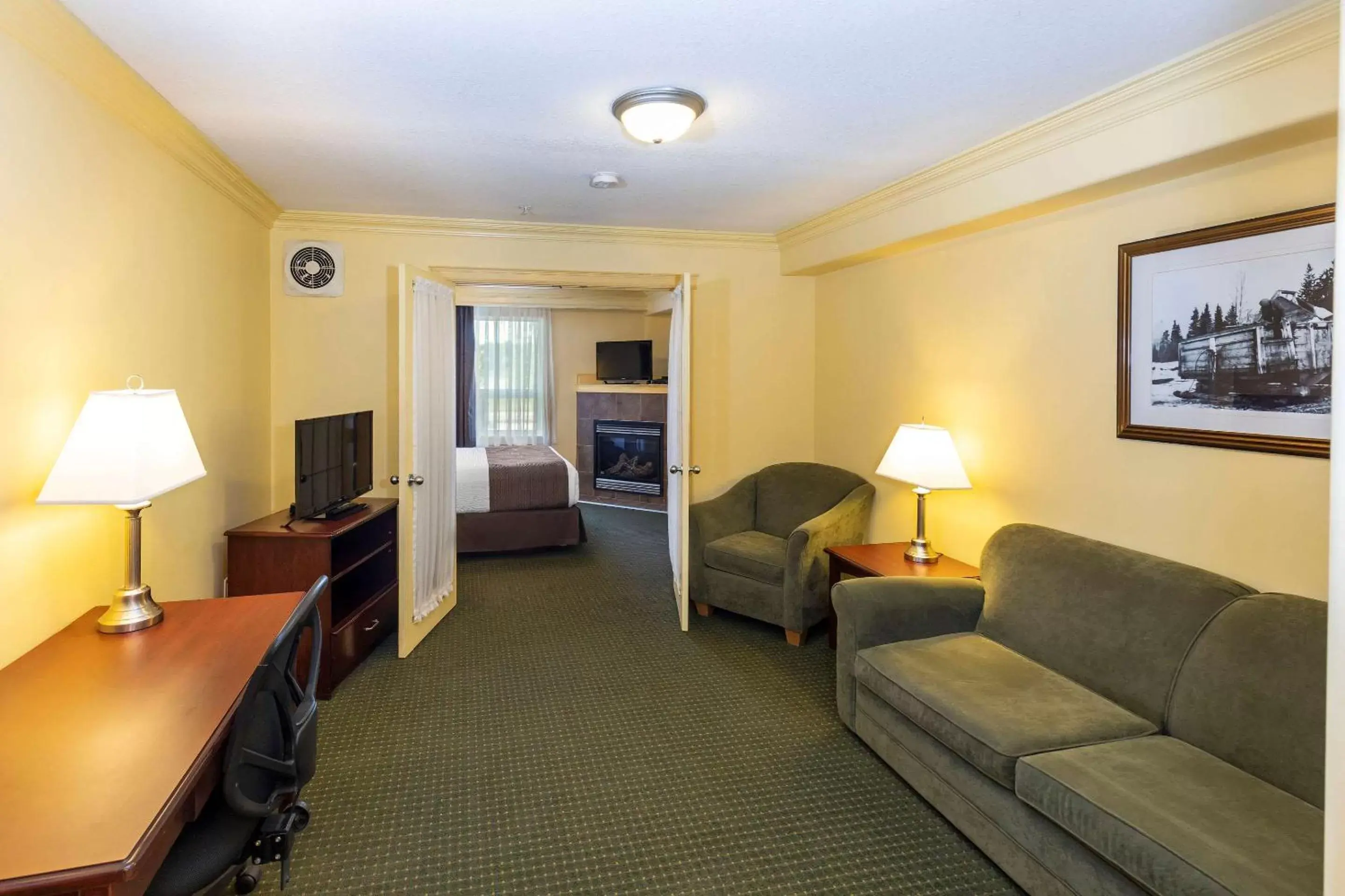 Bedroom, Seating Area in Quality Inn & Suites