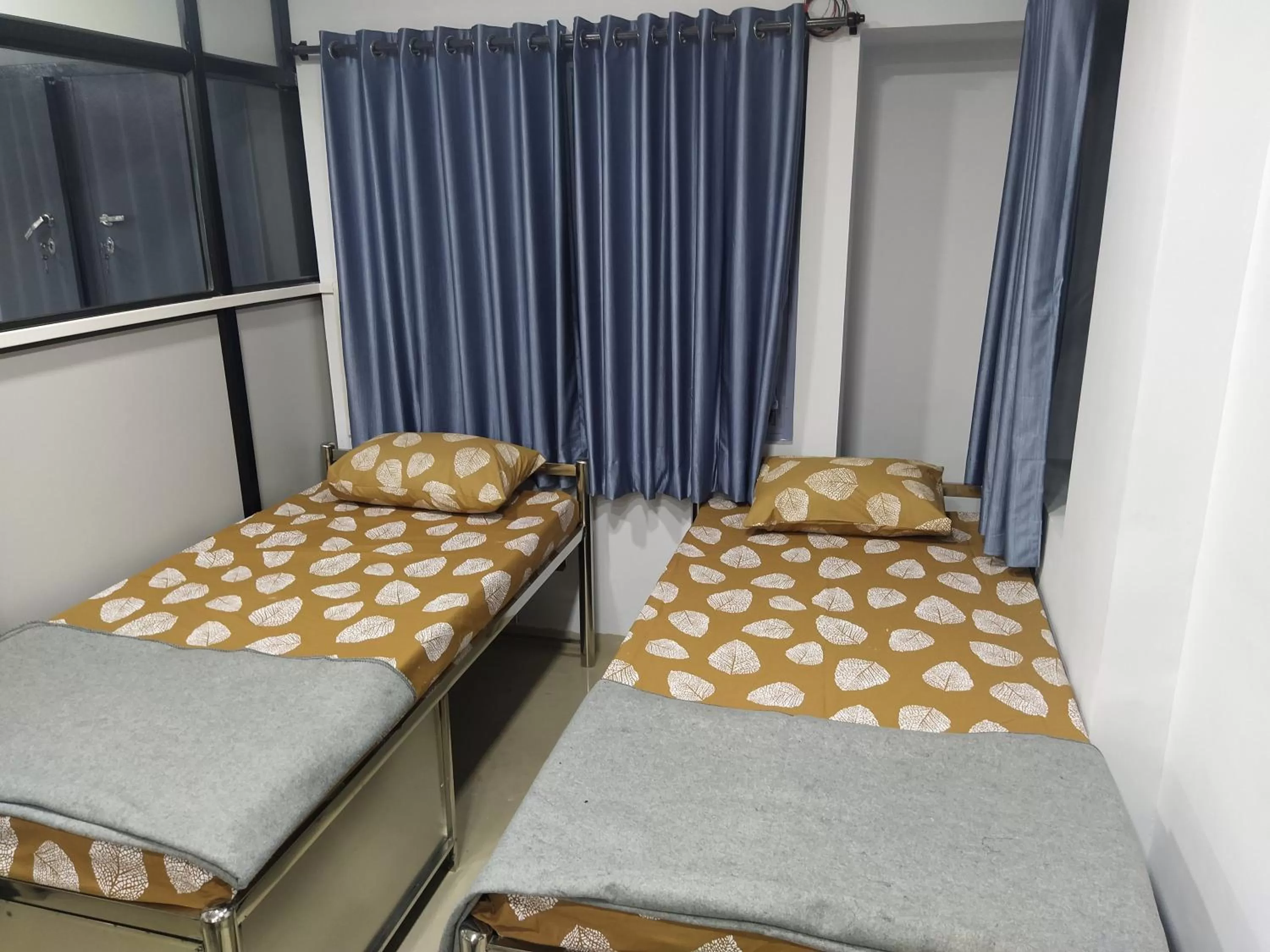 Bed in Shiv Sai Dormitory