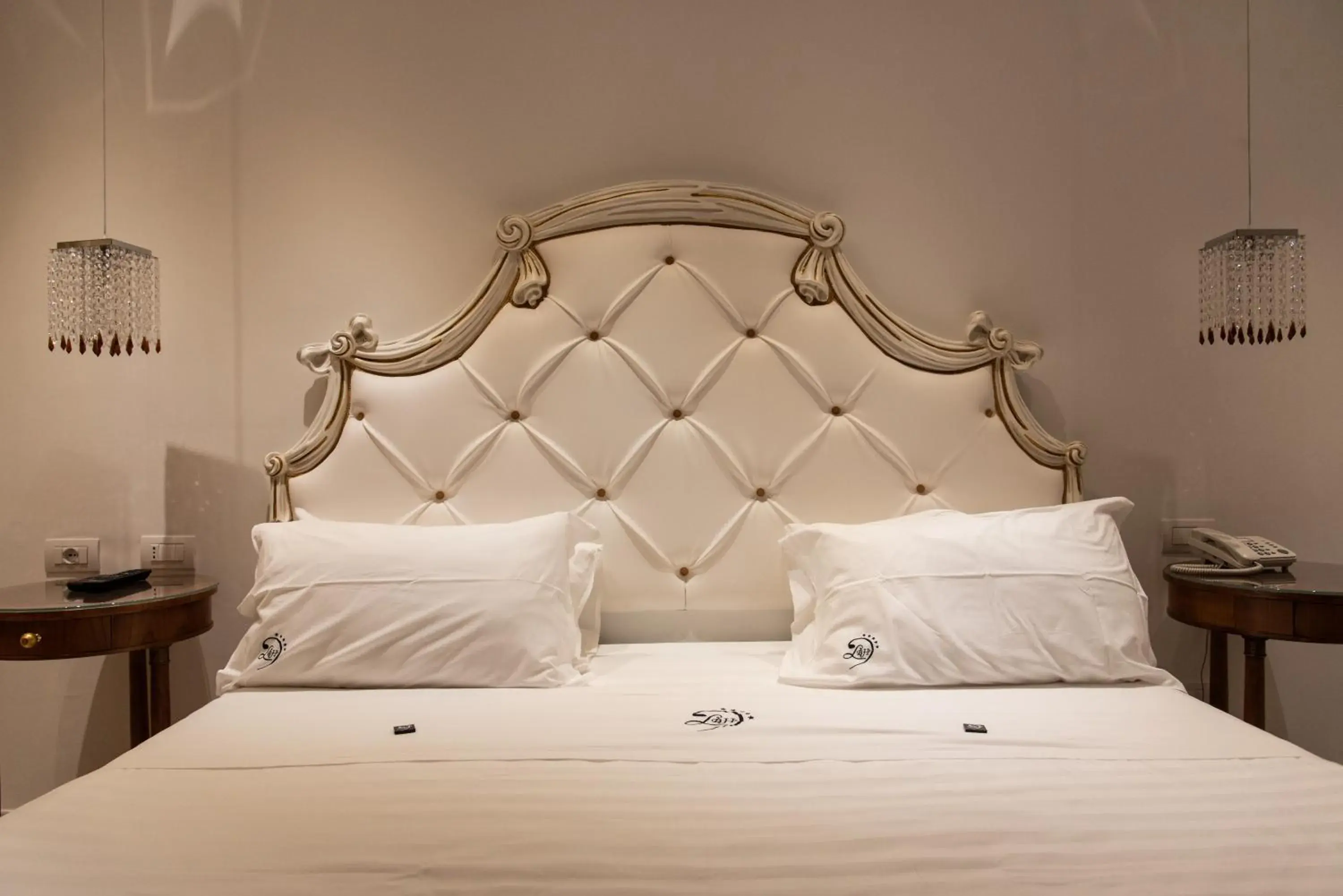 Bed in Ludwig Boutique Hotel