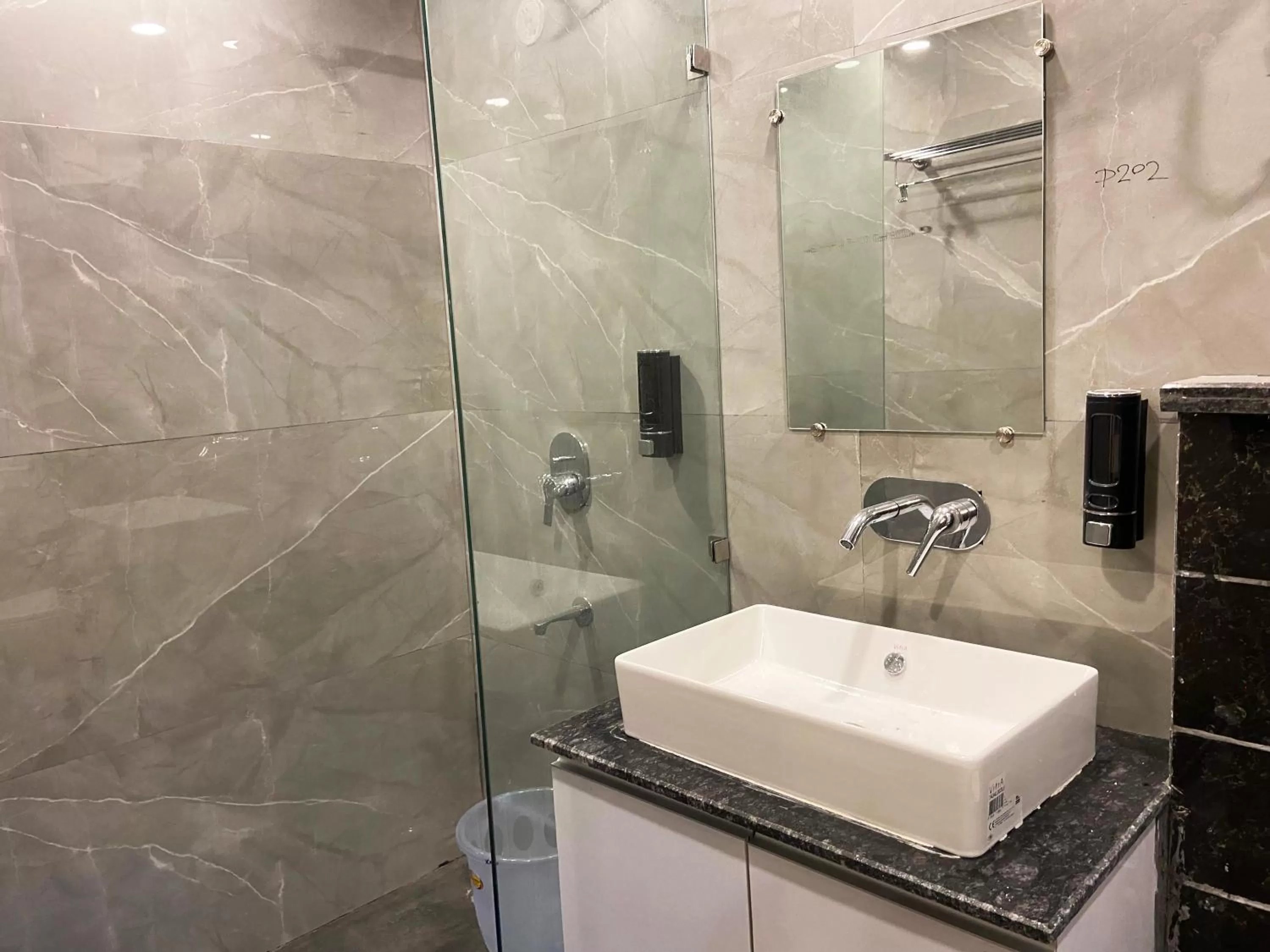 Bathroom in The Metro Stay By F9 Hotels-Near Sector 18 Metro Station Noida