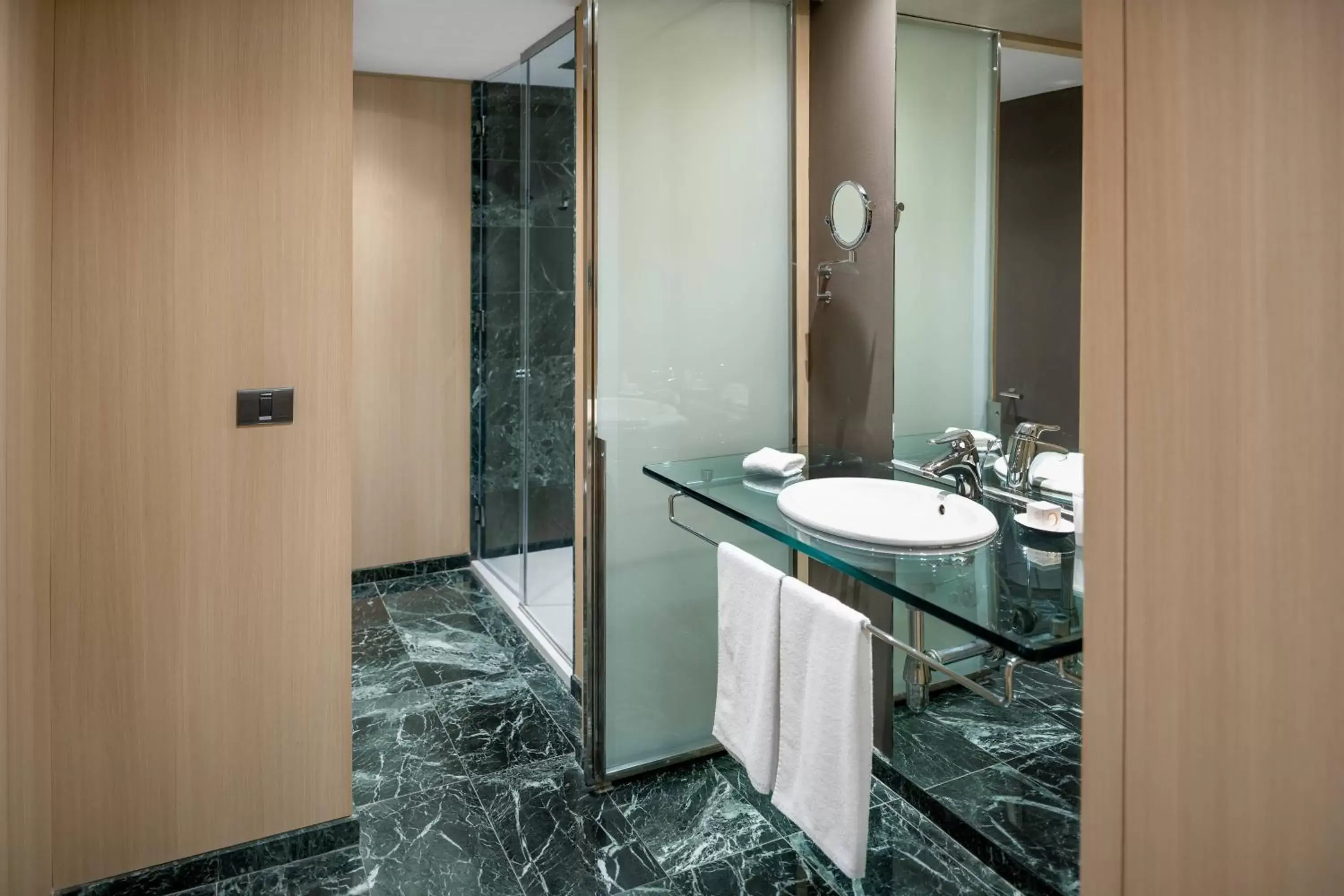 Bathroom in AC Hotel Málaga Palacio by Marriott