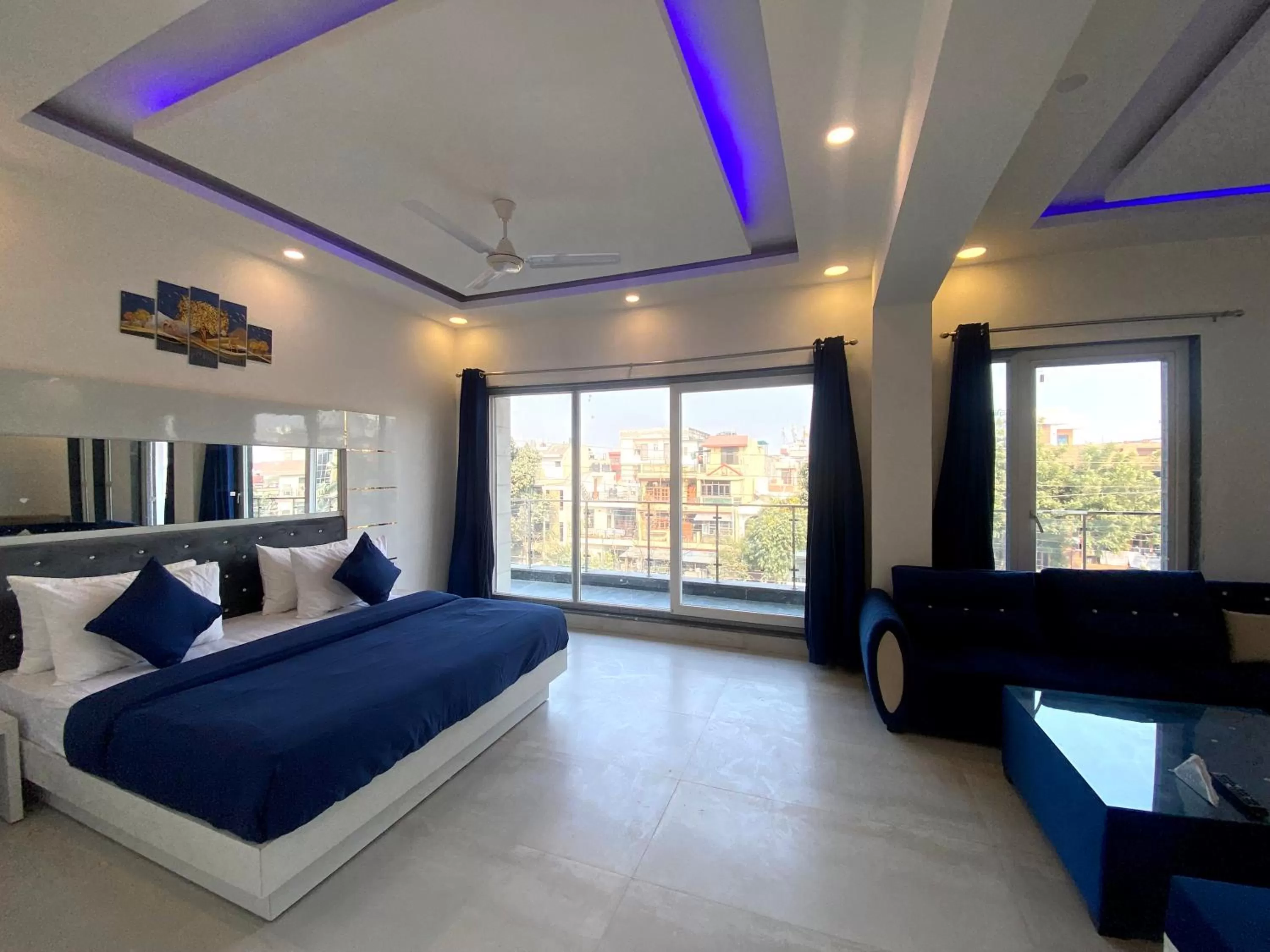 Bedroom in The Metro Stay By F9 Hotels-Near Sector 18 Metro Station Noida