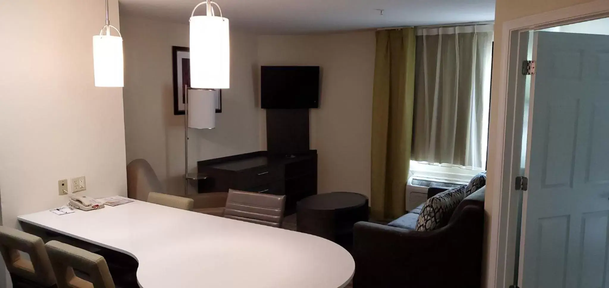 Photo of the whole room, TV/Entertainment Center in Candlewood Suites Houston Medical Center, an IHG Hotel
