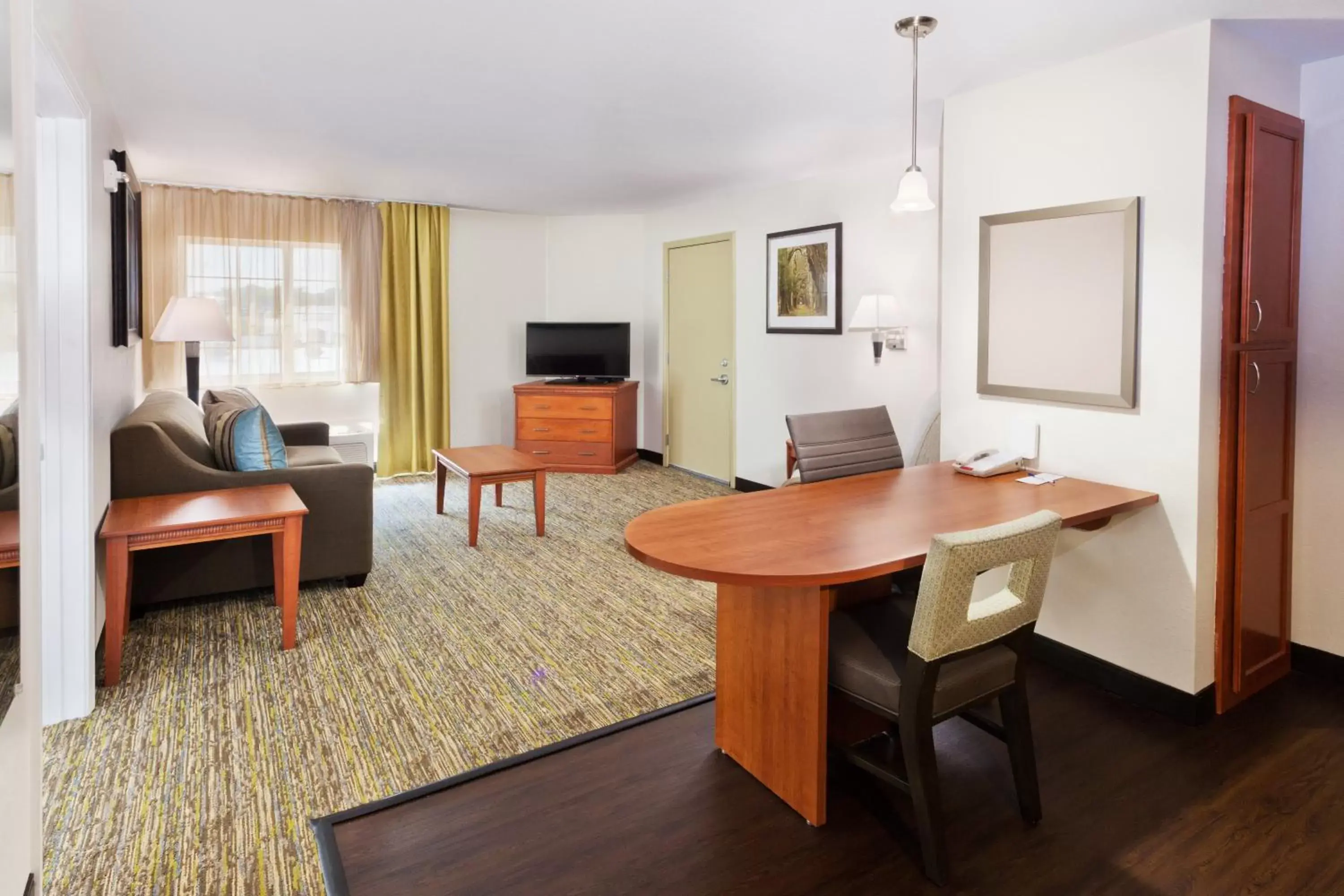 Photo of the whole room, Seating Area in Candlewood Suites Eastchase Park, an IHG Hotel