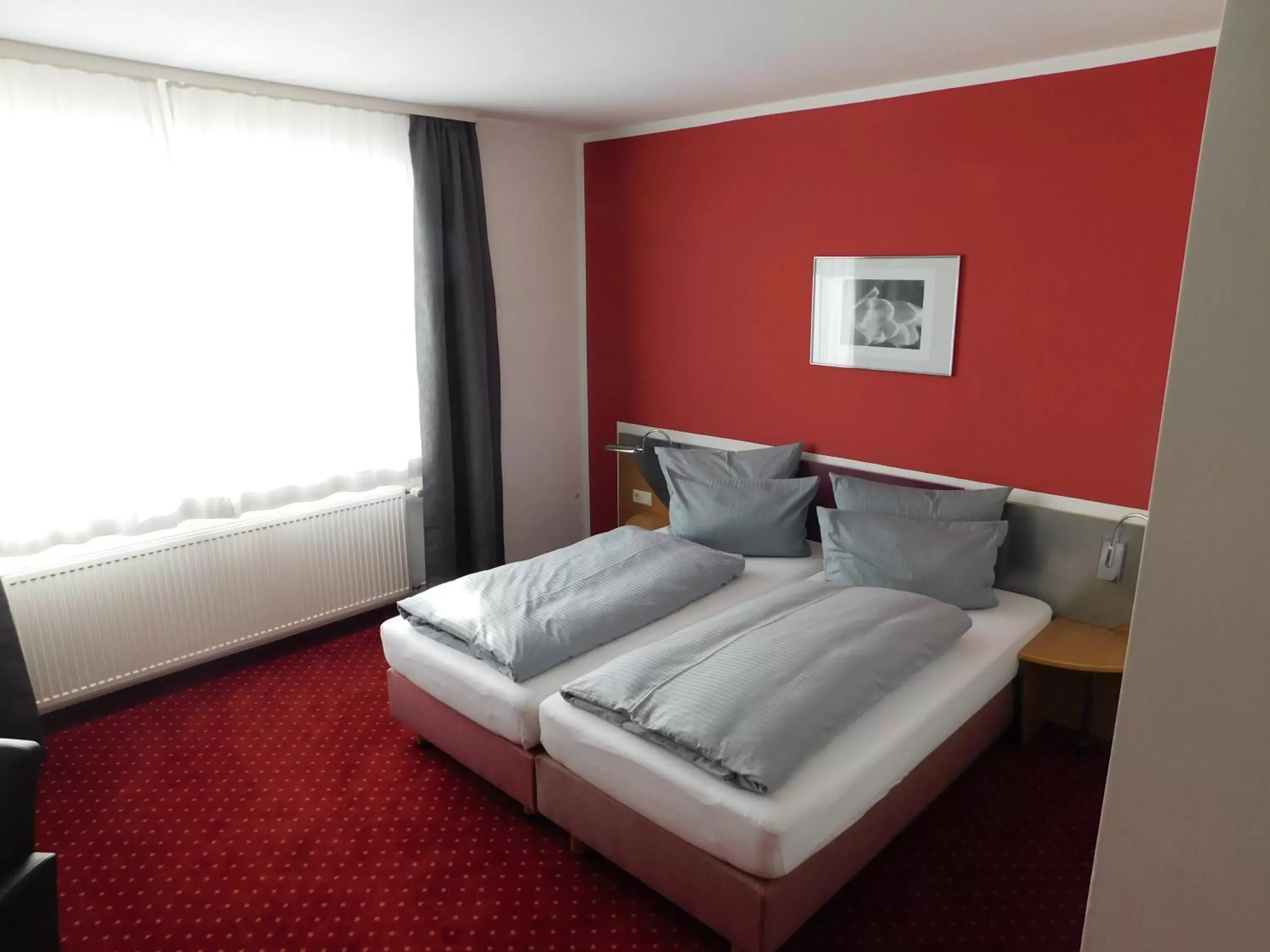 Photo of the whole room, Bed in Hotel KonradP Holzkirchen