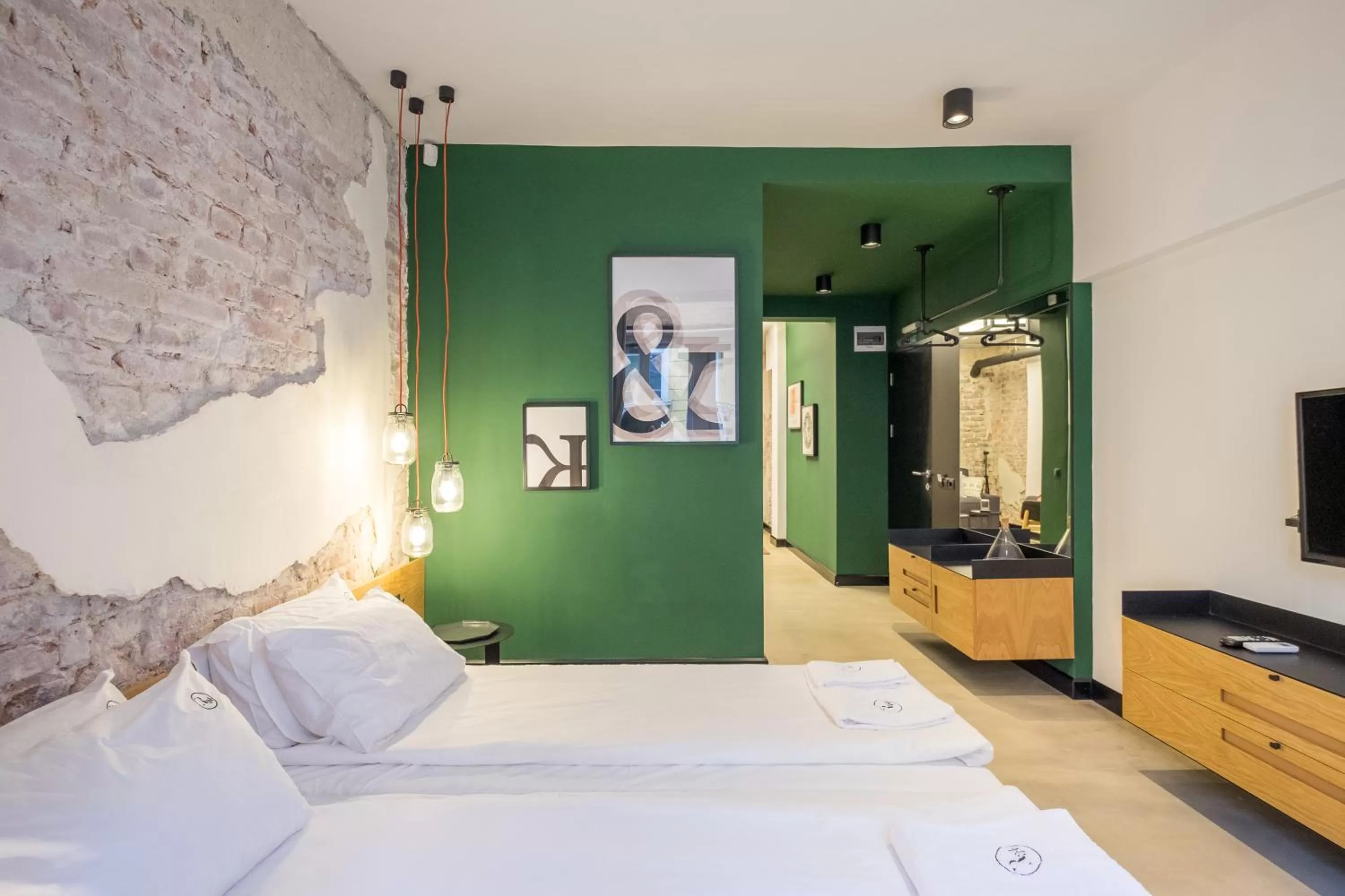 Bed in R34 Boutique Hotel