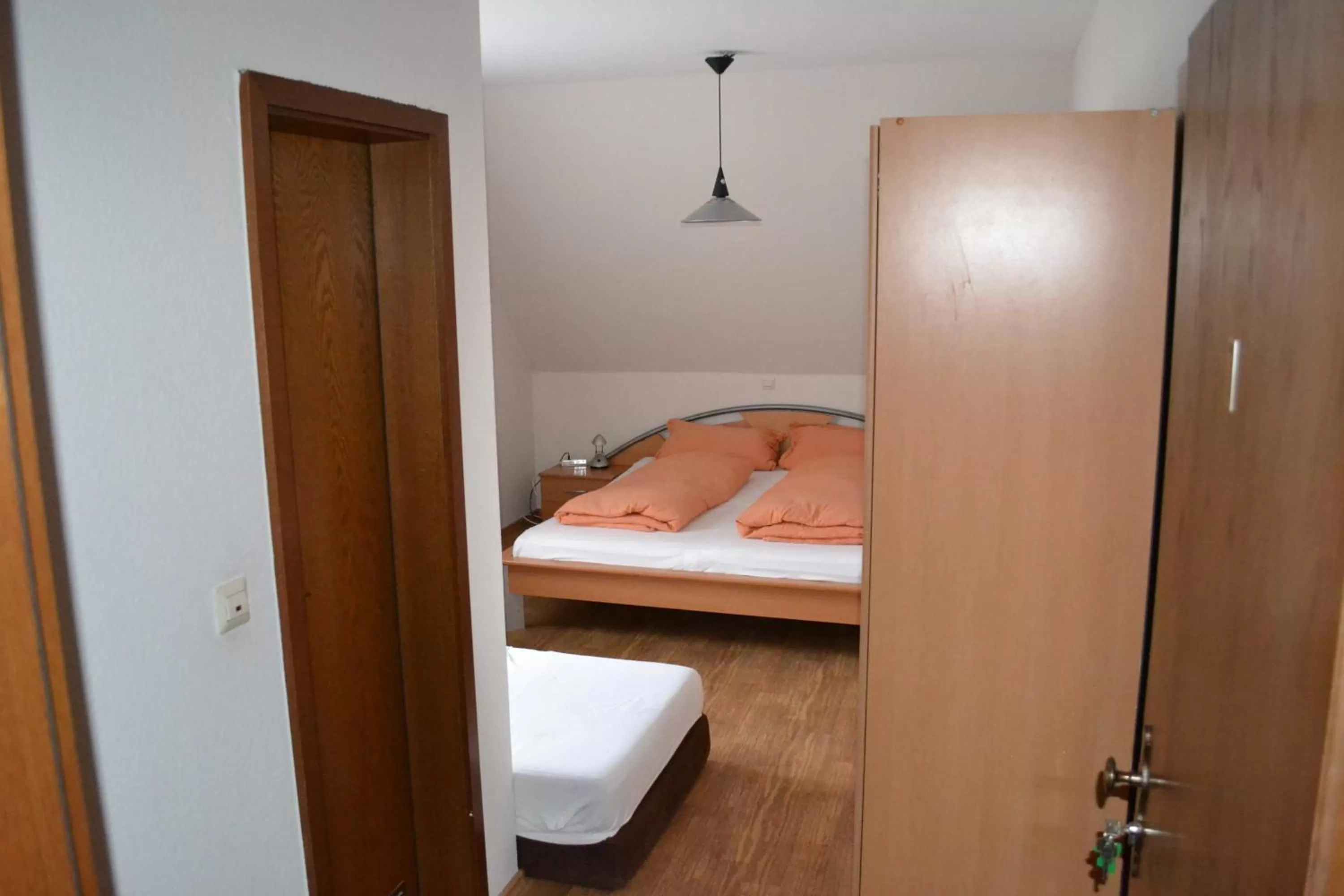 Photo of the whole room, Bed in Gaestehaus Tagescafe Eckenfels