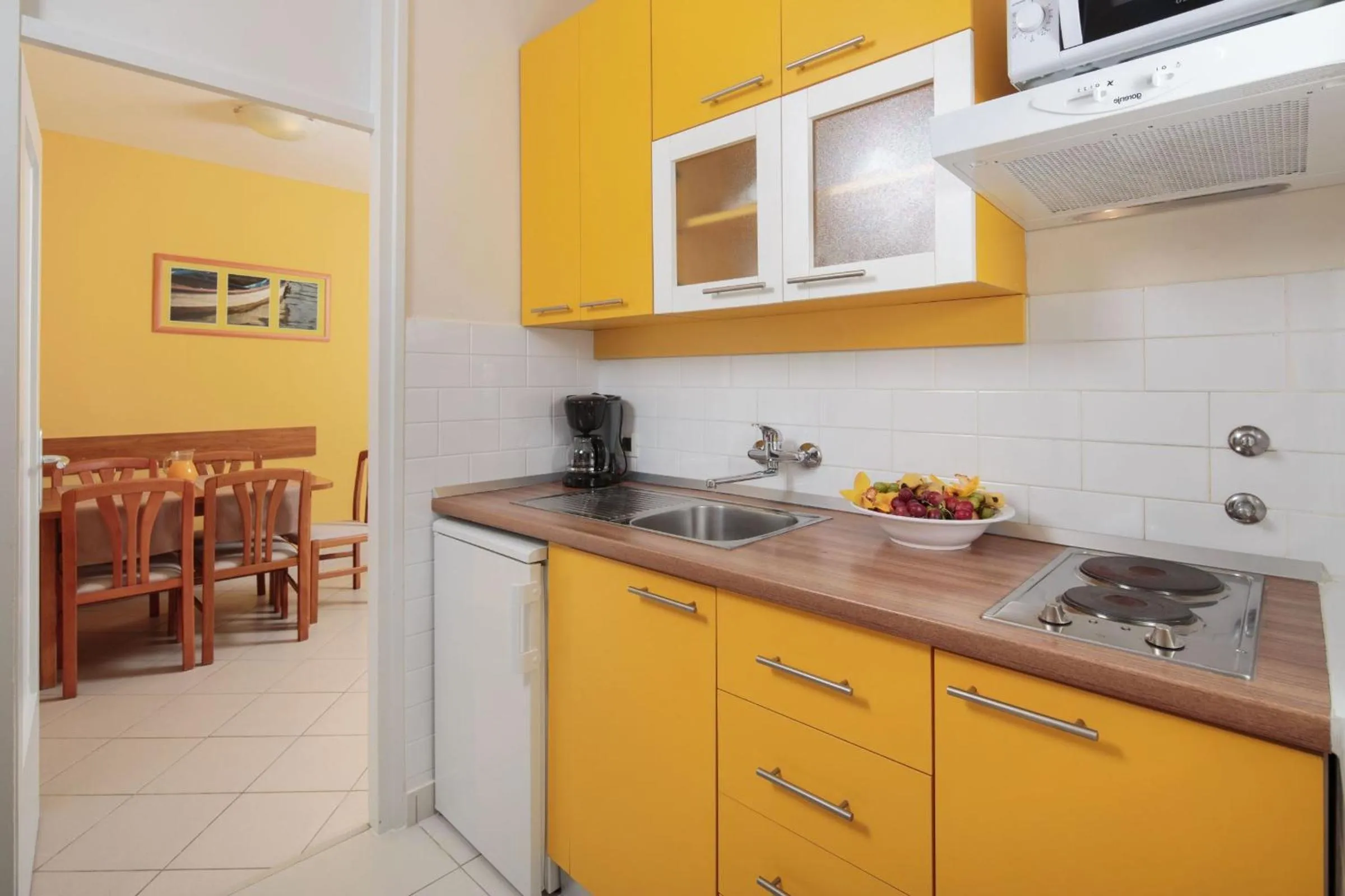 Kitchen or kitchenette in Apartments Katoro Plava Laguna