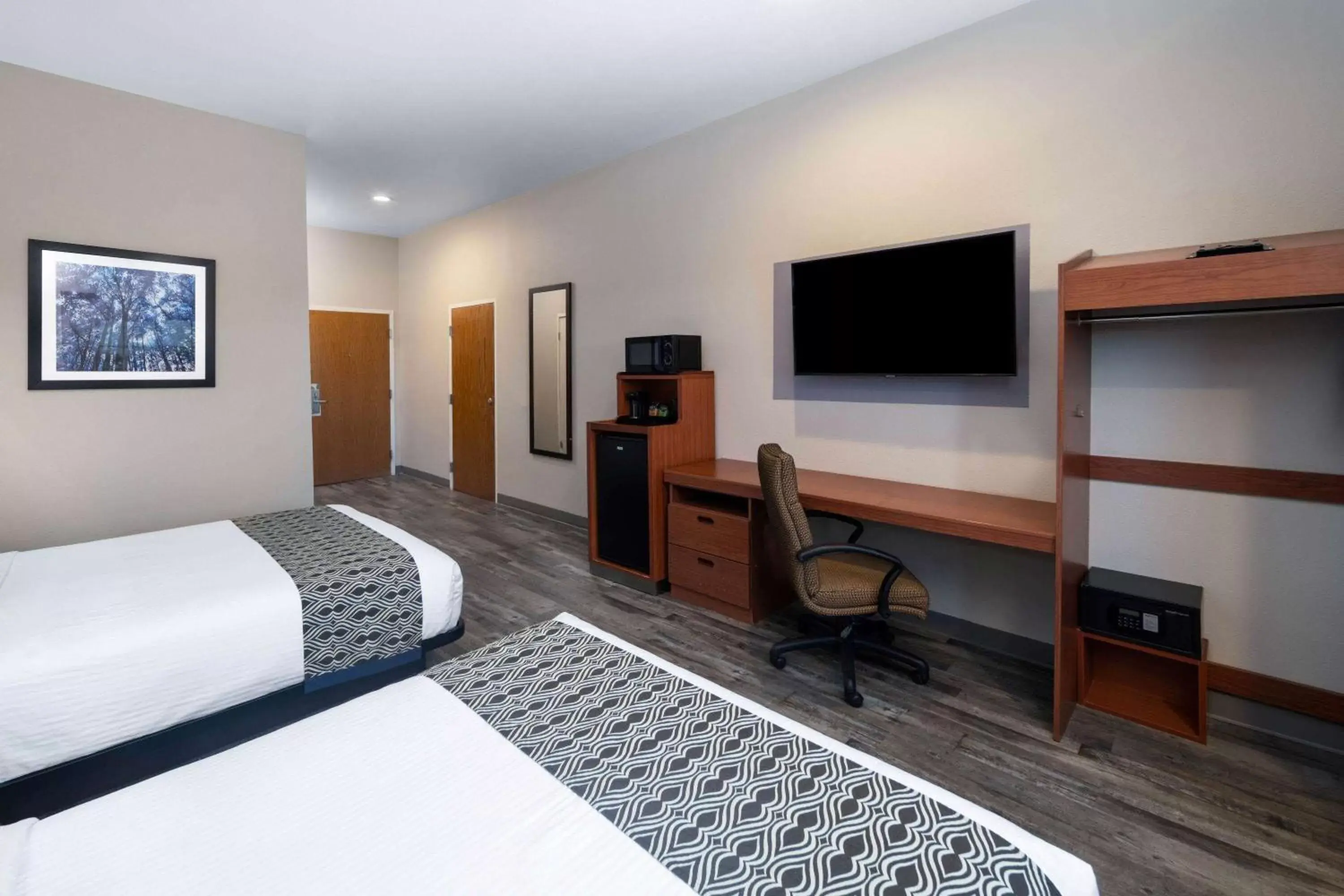 Photo of the whole room, TV/Entertainment Center in Microtel Inn & Suites by Wyndham Tracy