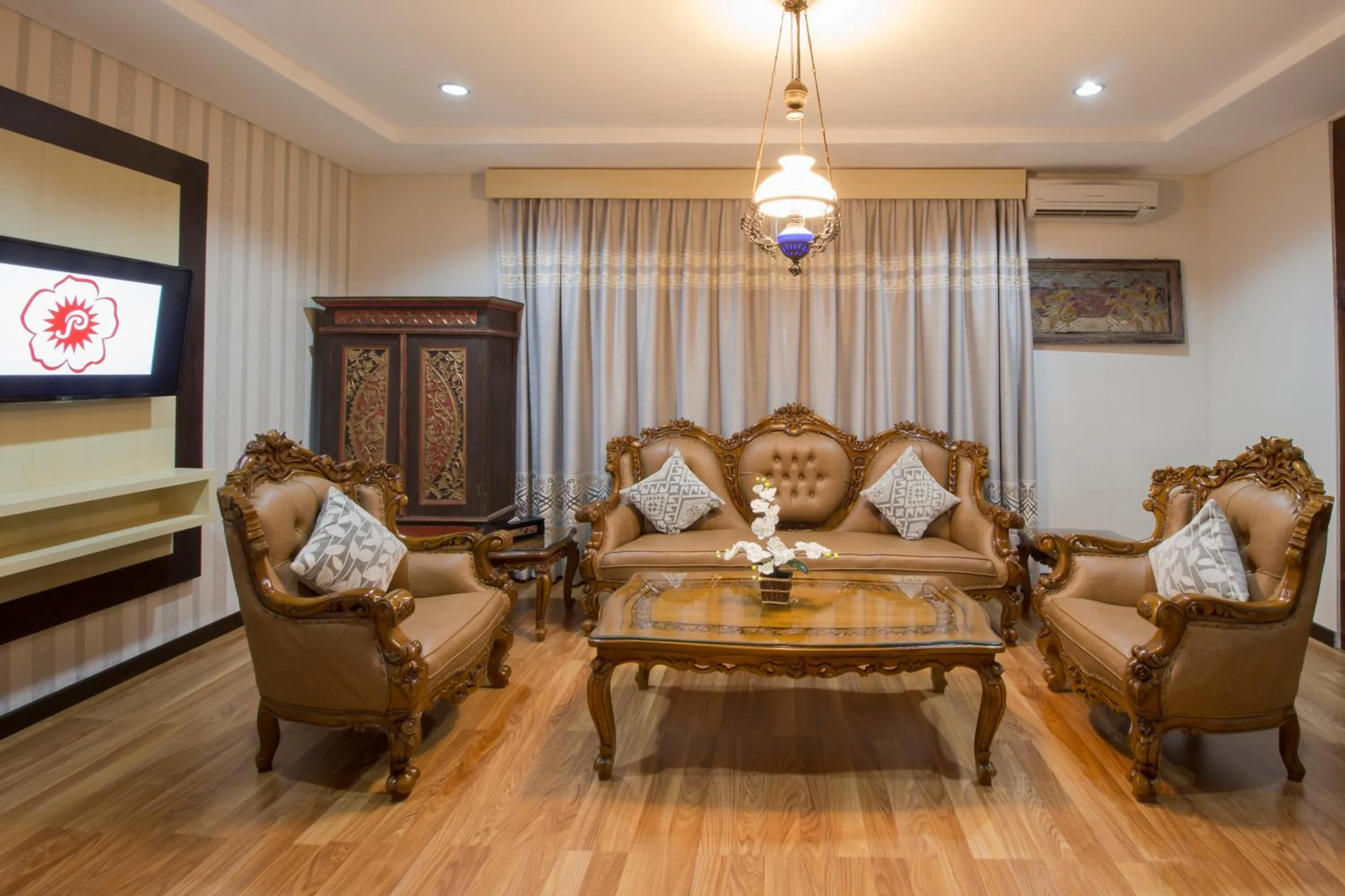 Living room in Grand Puri Saron Hotel Yogyakarta