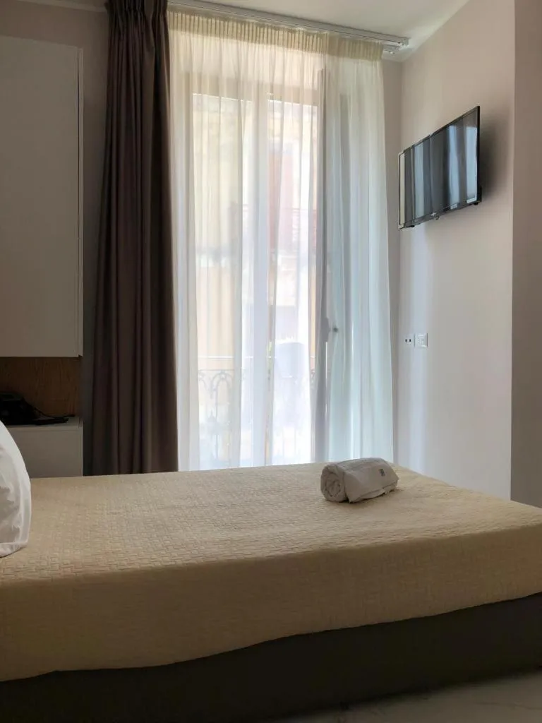 Bed in Albergo Milazzo Inn AiMori