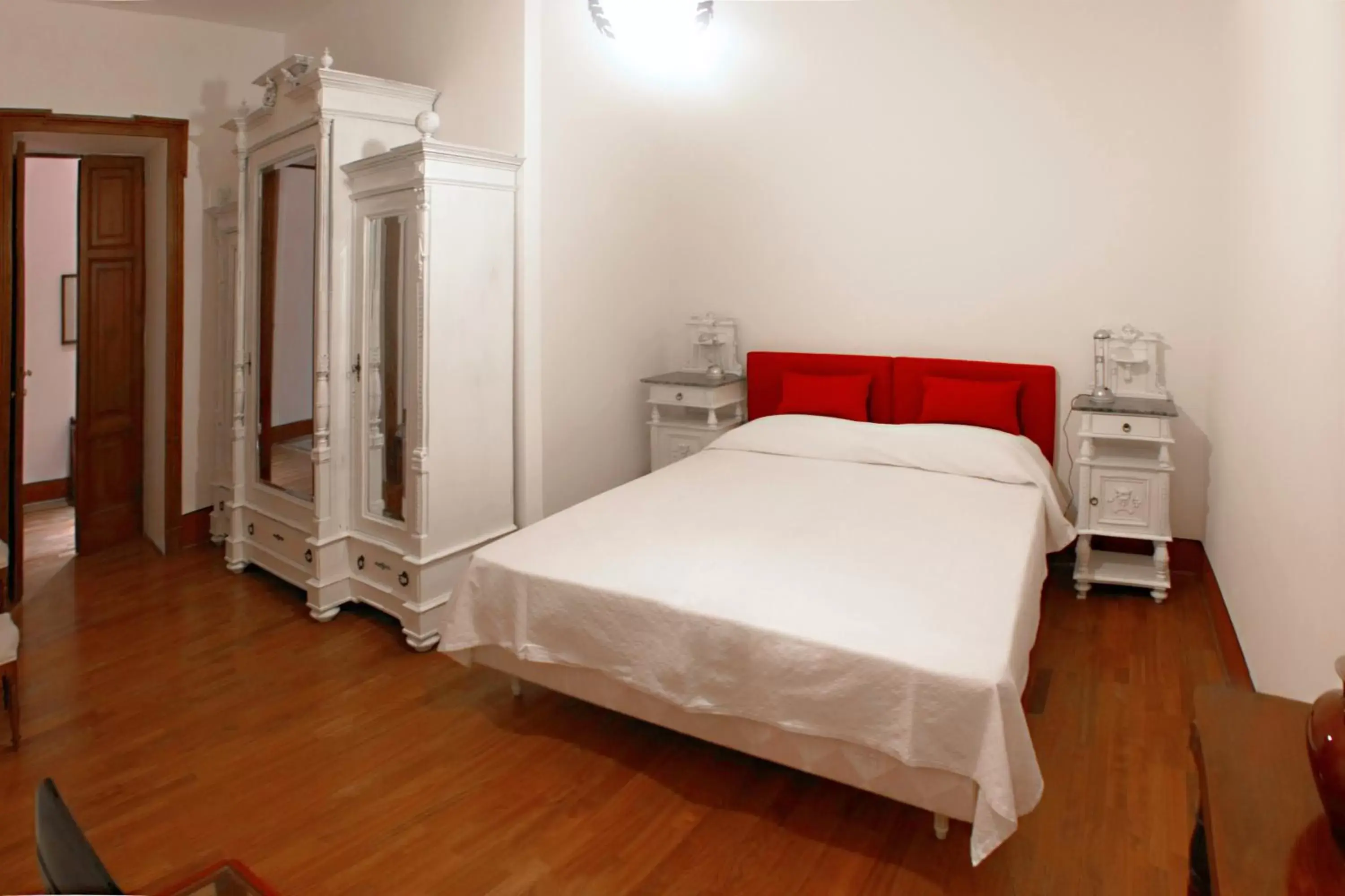 Bed in Bellezza Suites