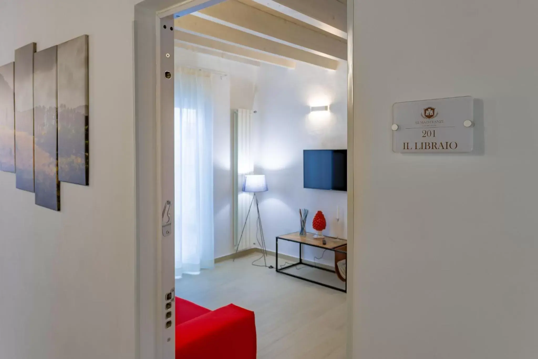Seating area, TV/Entertainment Center in Le Maestranze Deluxe Rooms