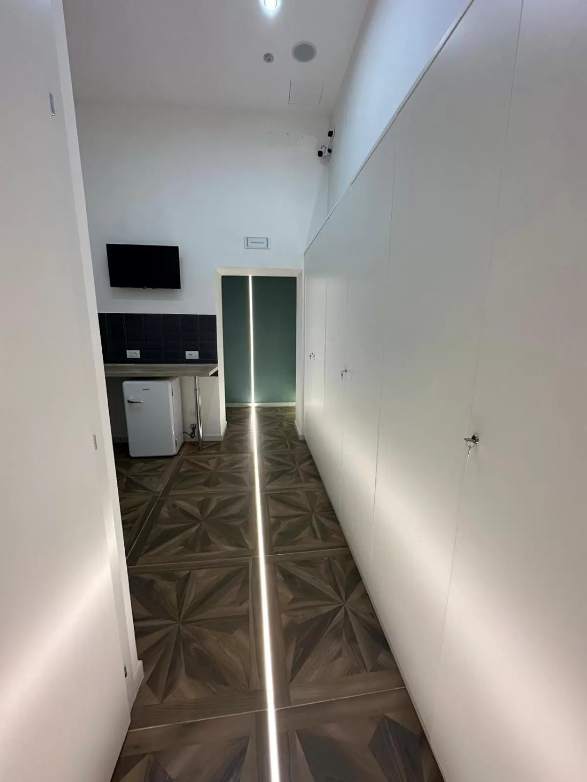 Communal lounge/ TV room, Kitchen/Kitchenette in San Ferdinando suite room