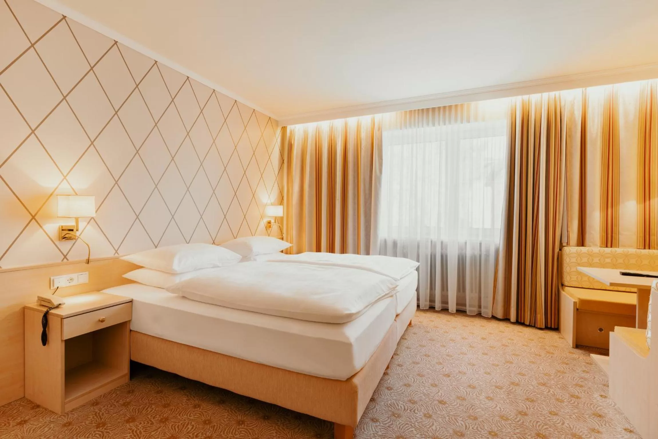 Bed in Hotel Scherer