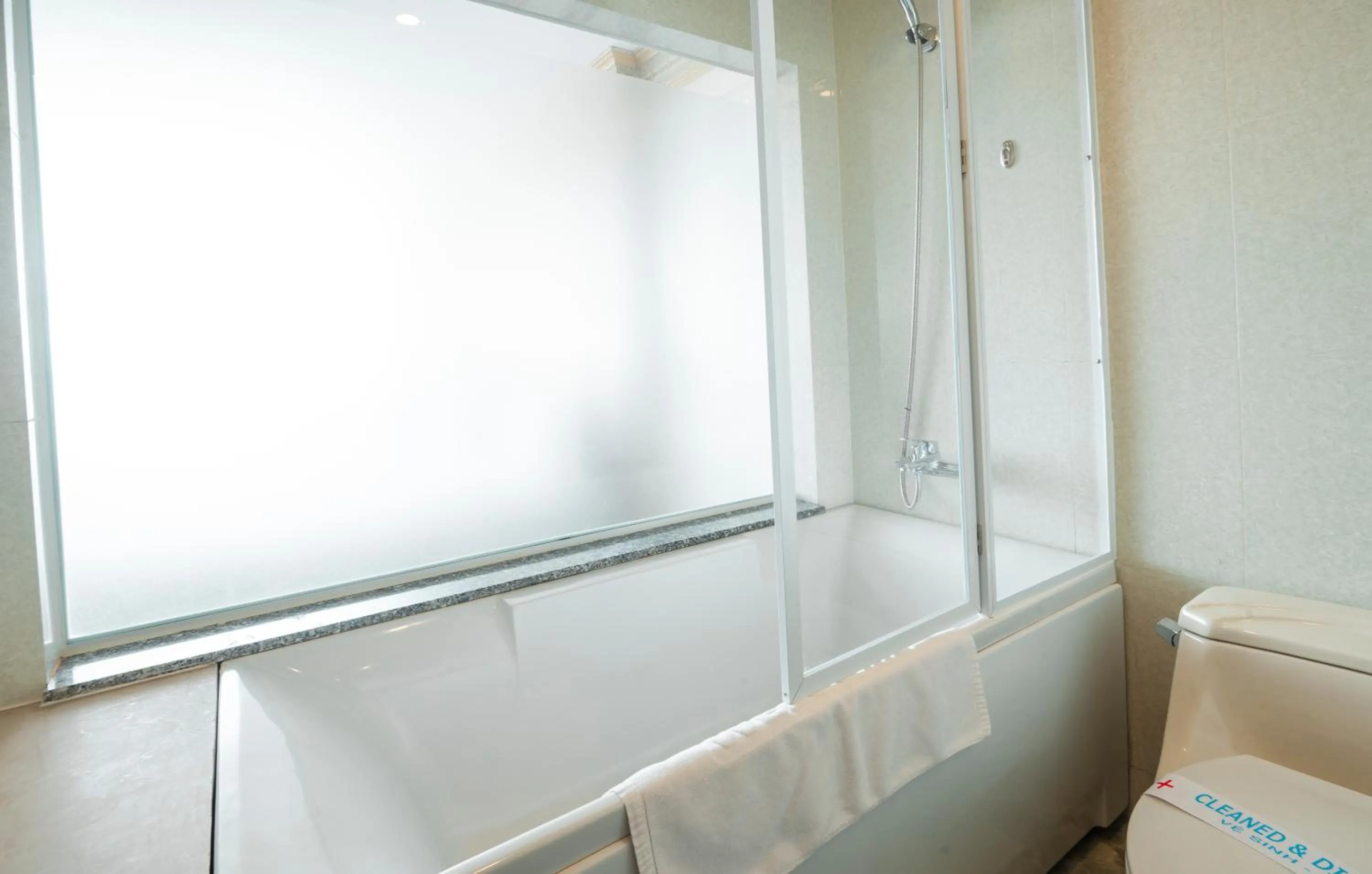 Shower in Lotus Saigon Hotel