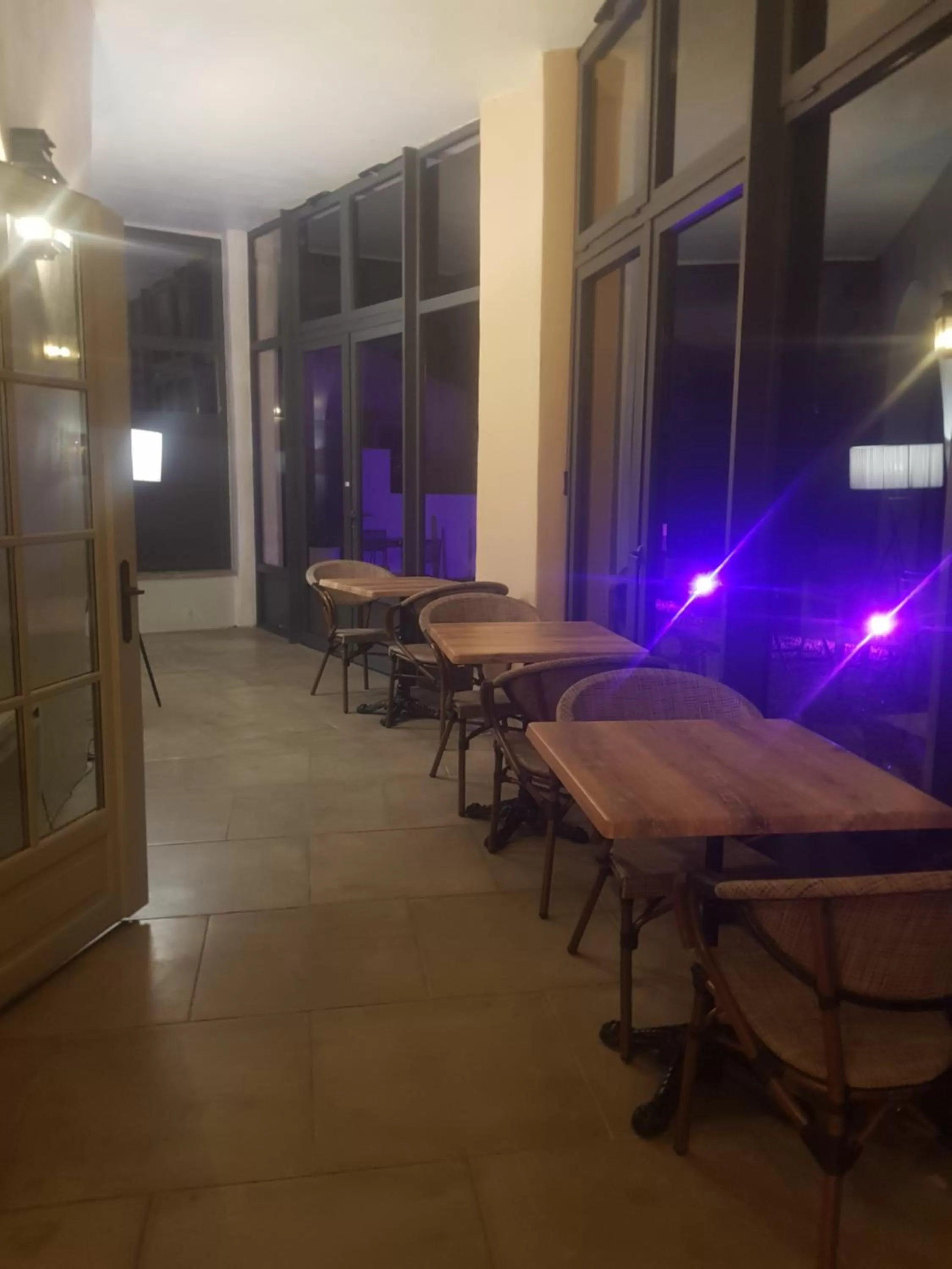 Communal lounge/ TV room in Le Couvent d'Hérépian - Hôtel & Spa