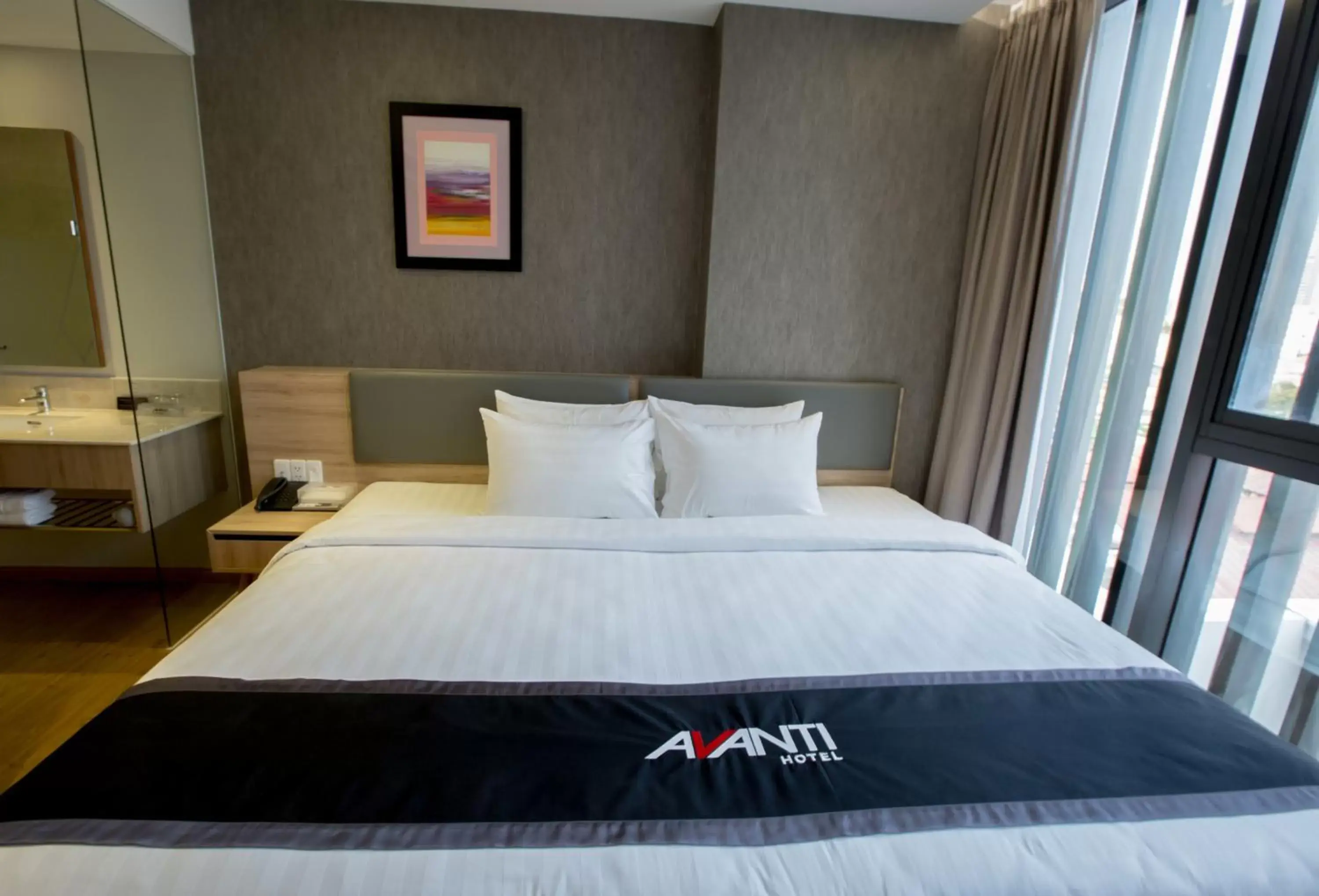 Bed in Avanti Hotel