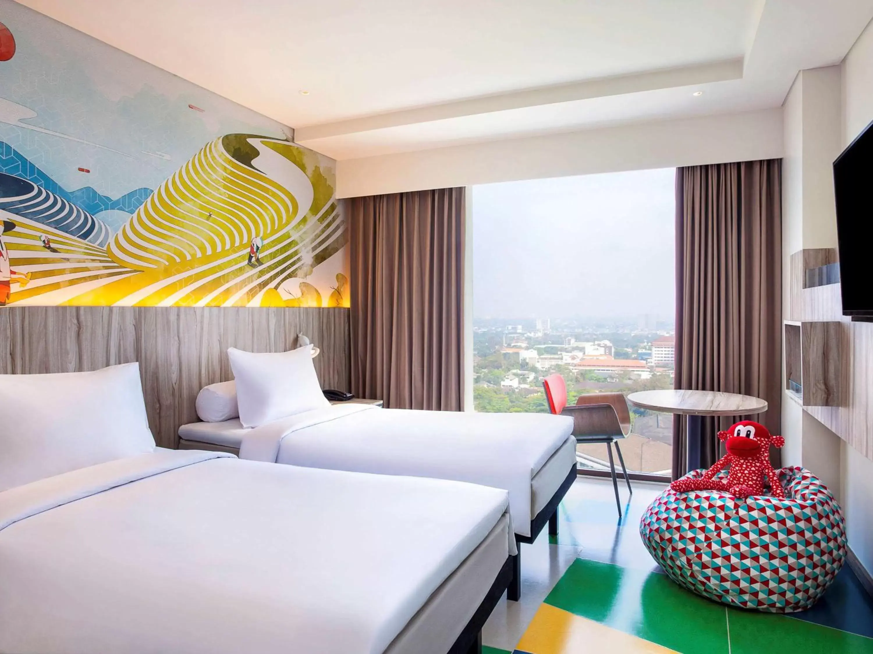 Photo of the whole room in ibis Styles Bandung Grand Central