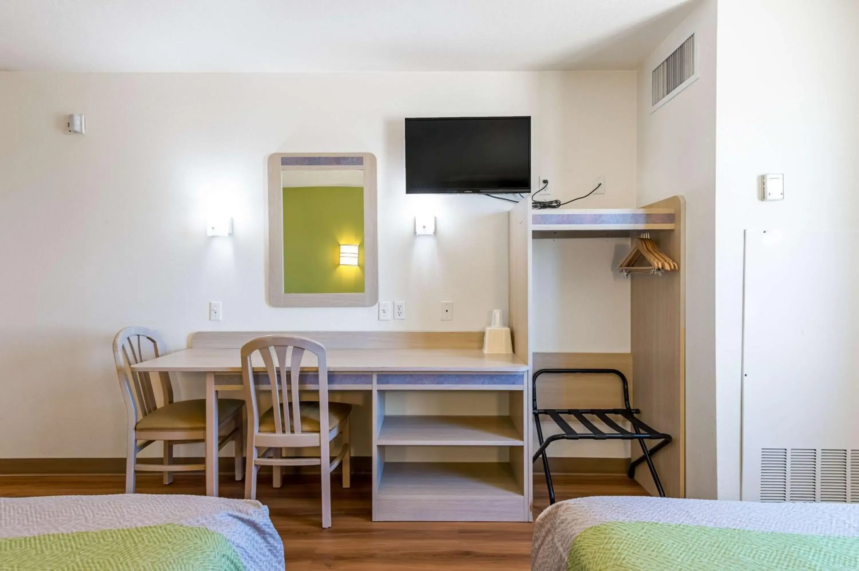 Photo of the whole room, TV/Entertainment Center in Motel 6-Cedar City, UT