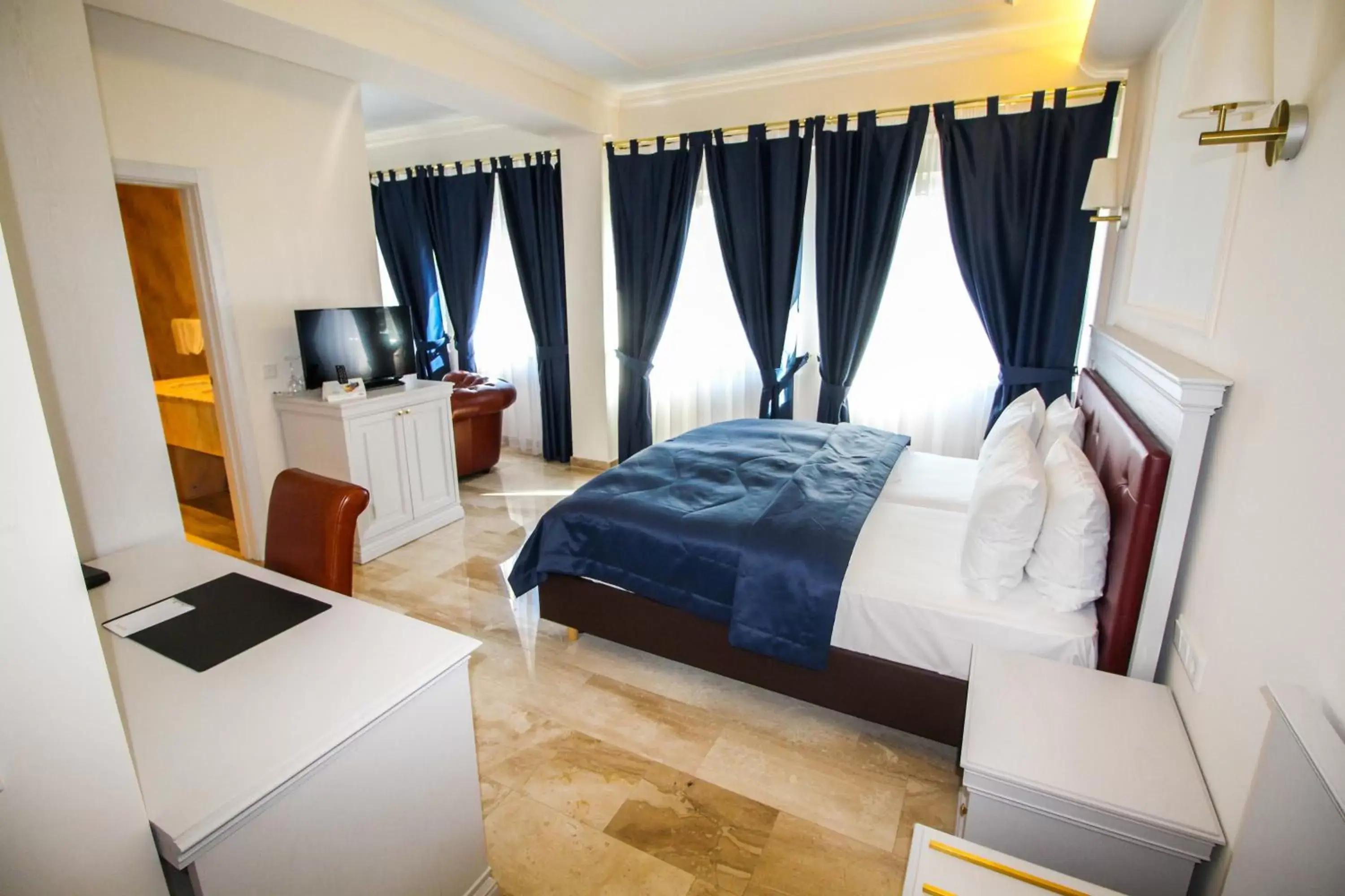 Bed in Grand Hotel Palladium