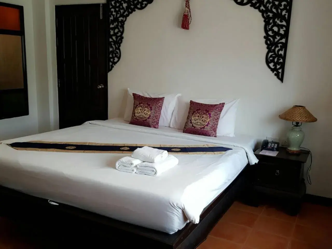 Bed in Wangburapa Grand Hotel