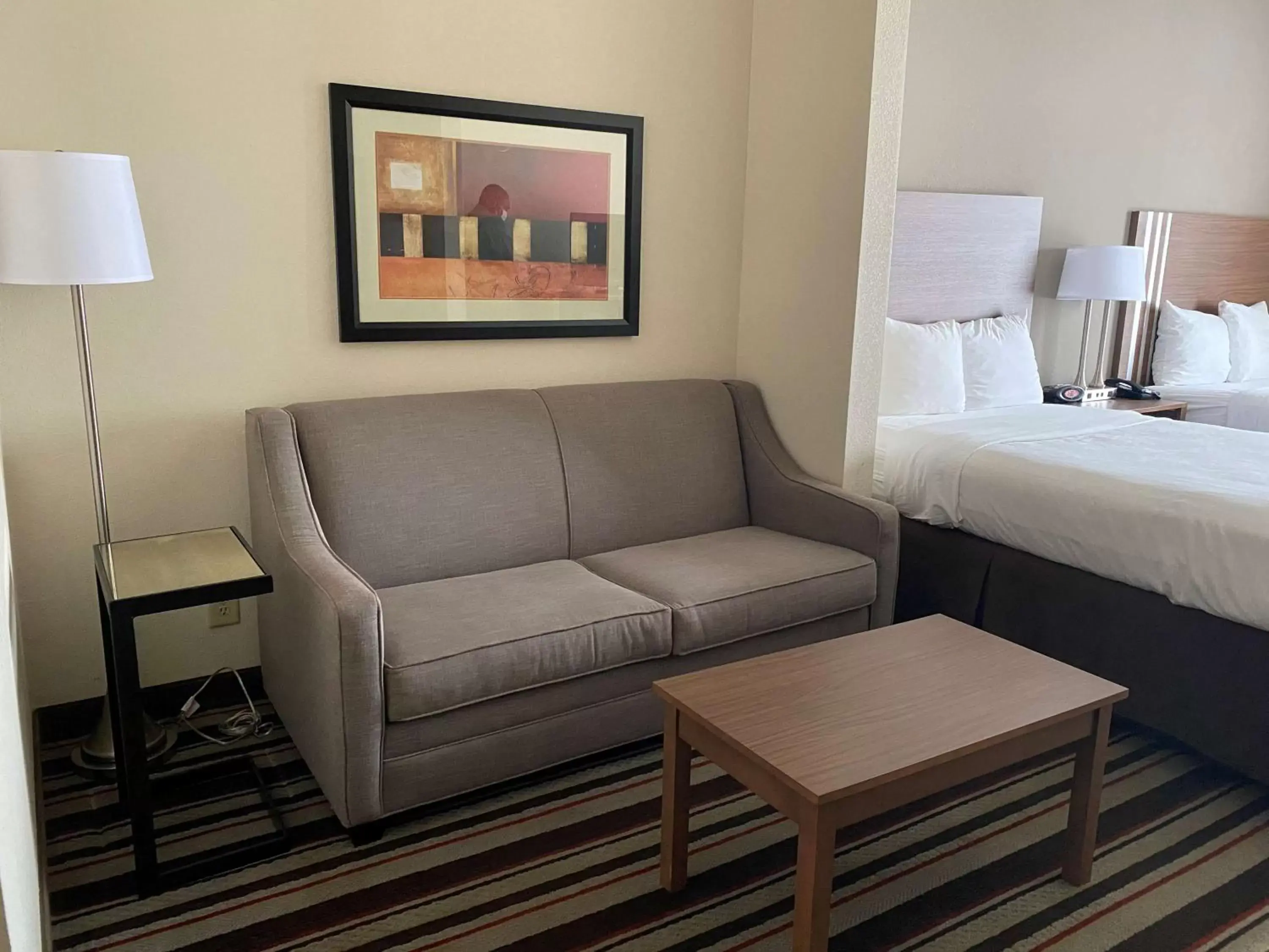 Bedroom, Seating Area in Best Western Windsor Inn and Suites