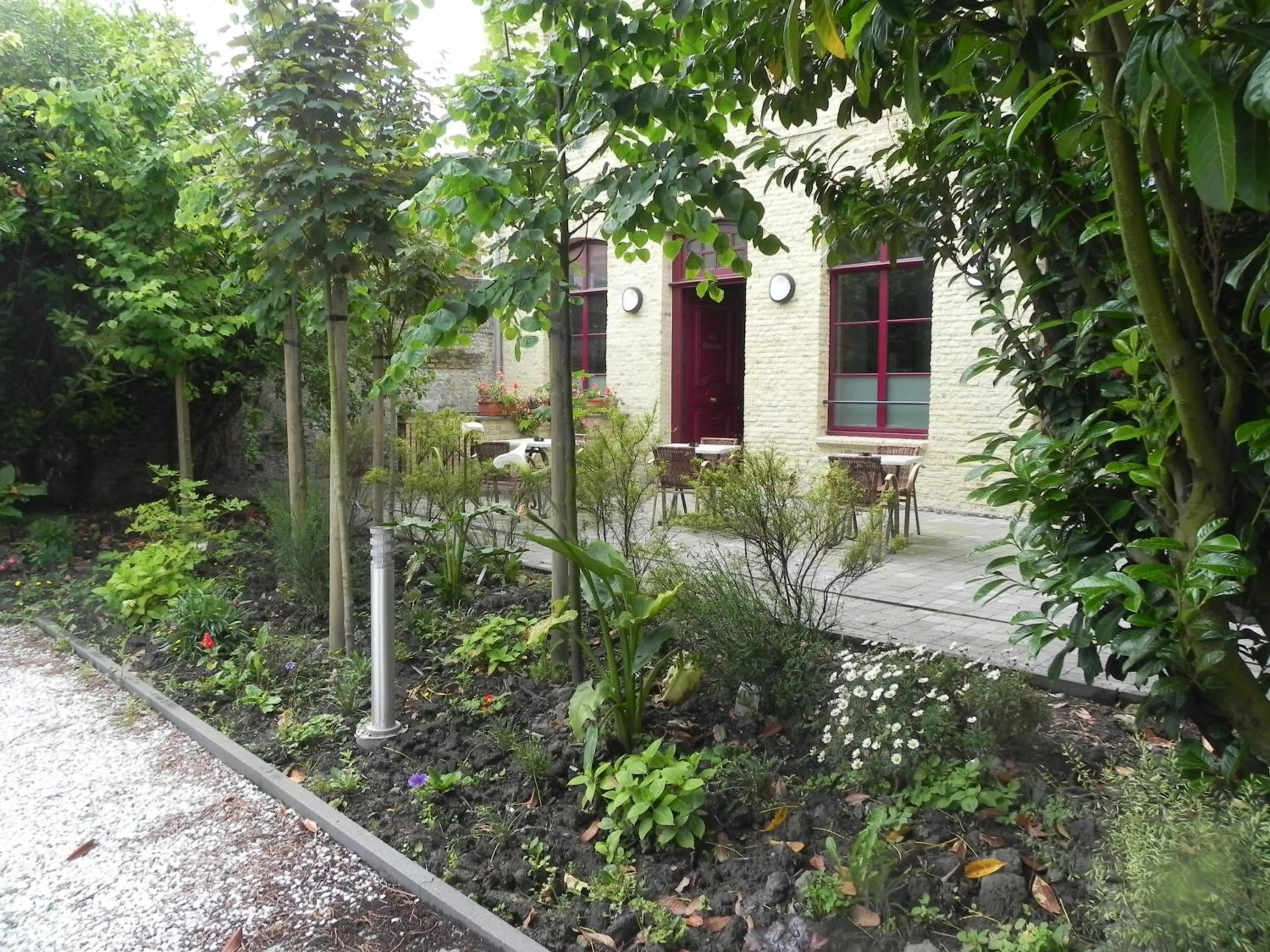 Garden in Hôtel - Restaurant Au Tonnelier
