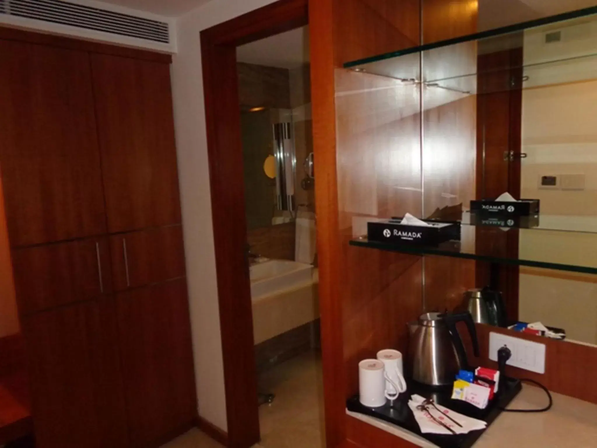 Coffee/tea facilities, Bathroom in Ramada Ahmedabad