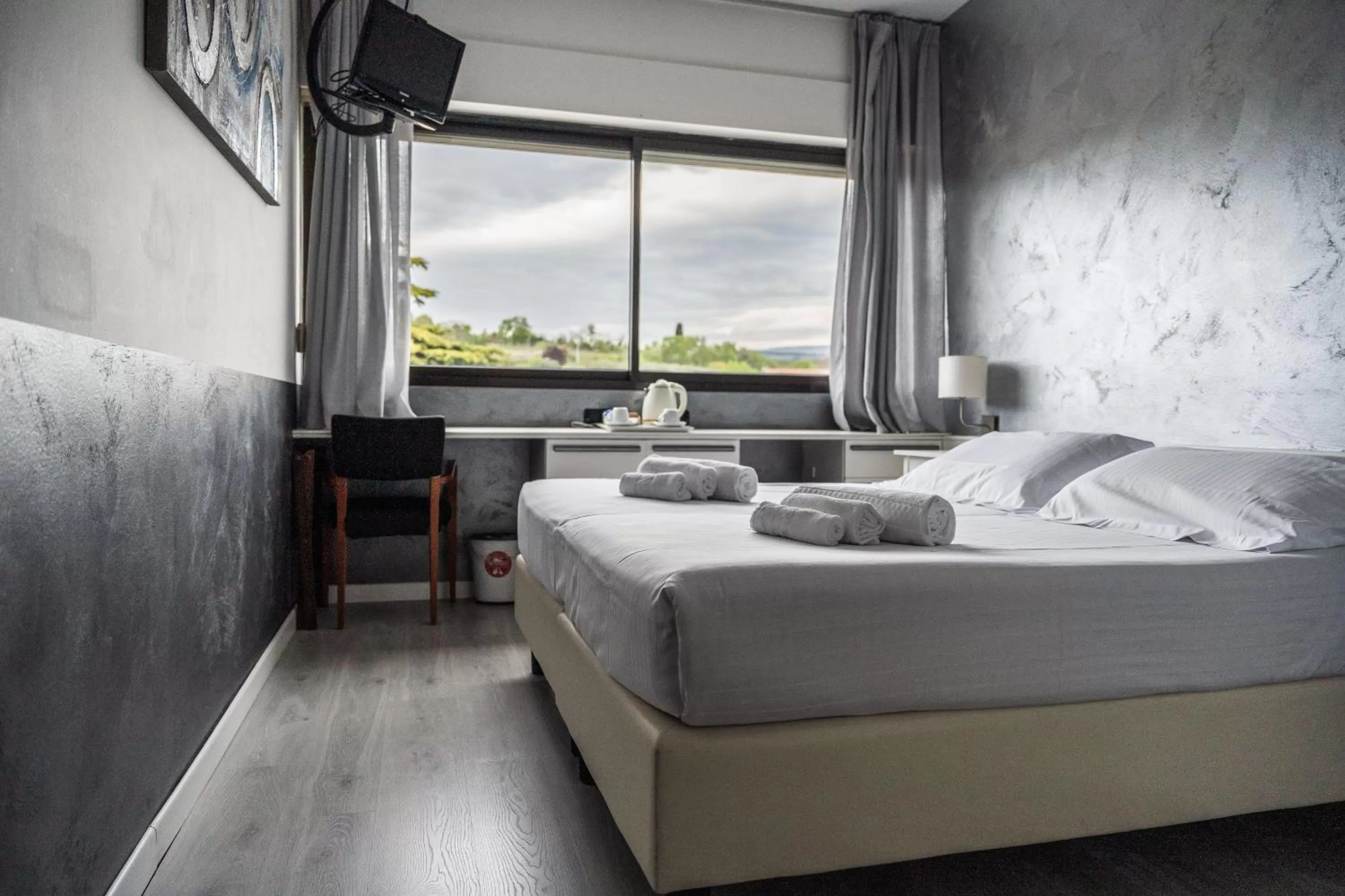 Bedroom, Bed in Hotel Valpolicella International