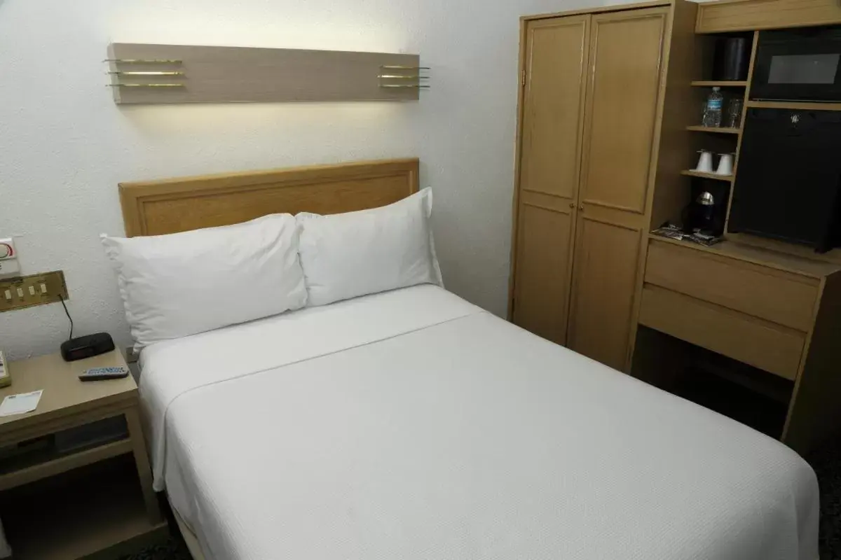 Bed in Hotel Monterrey Macroplaza