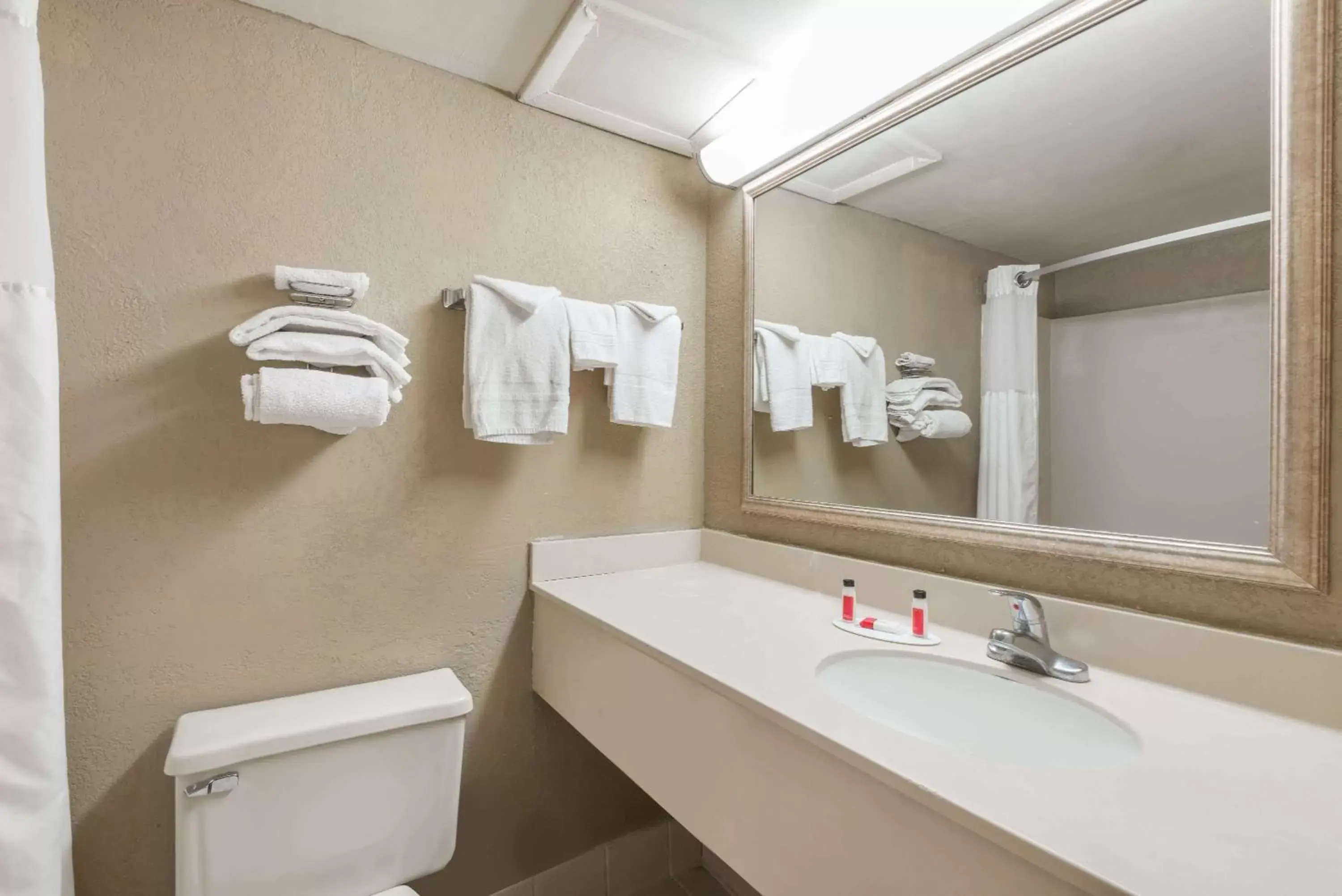 Bathroom in Super 8 by Wyndham Miamisburg Dayton S Area OH