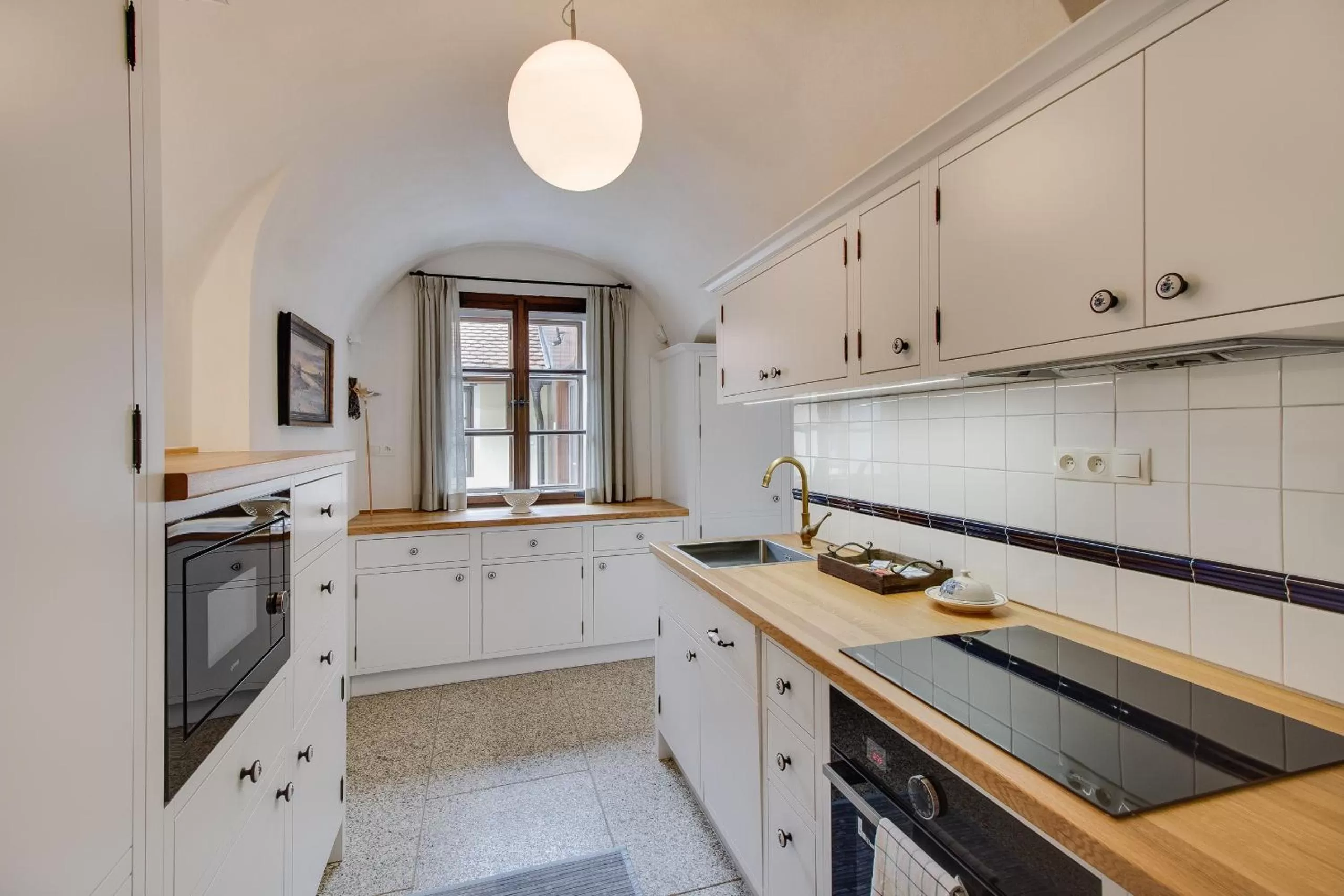 Kitchen or kitchenette in Apartmány Šupina