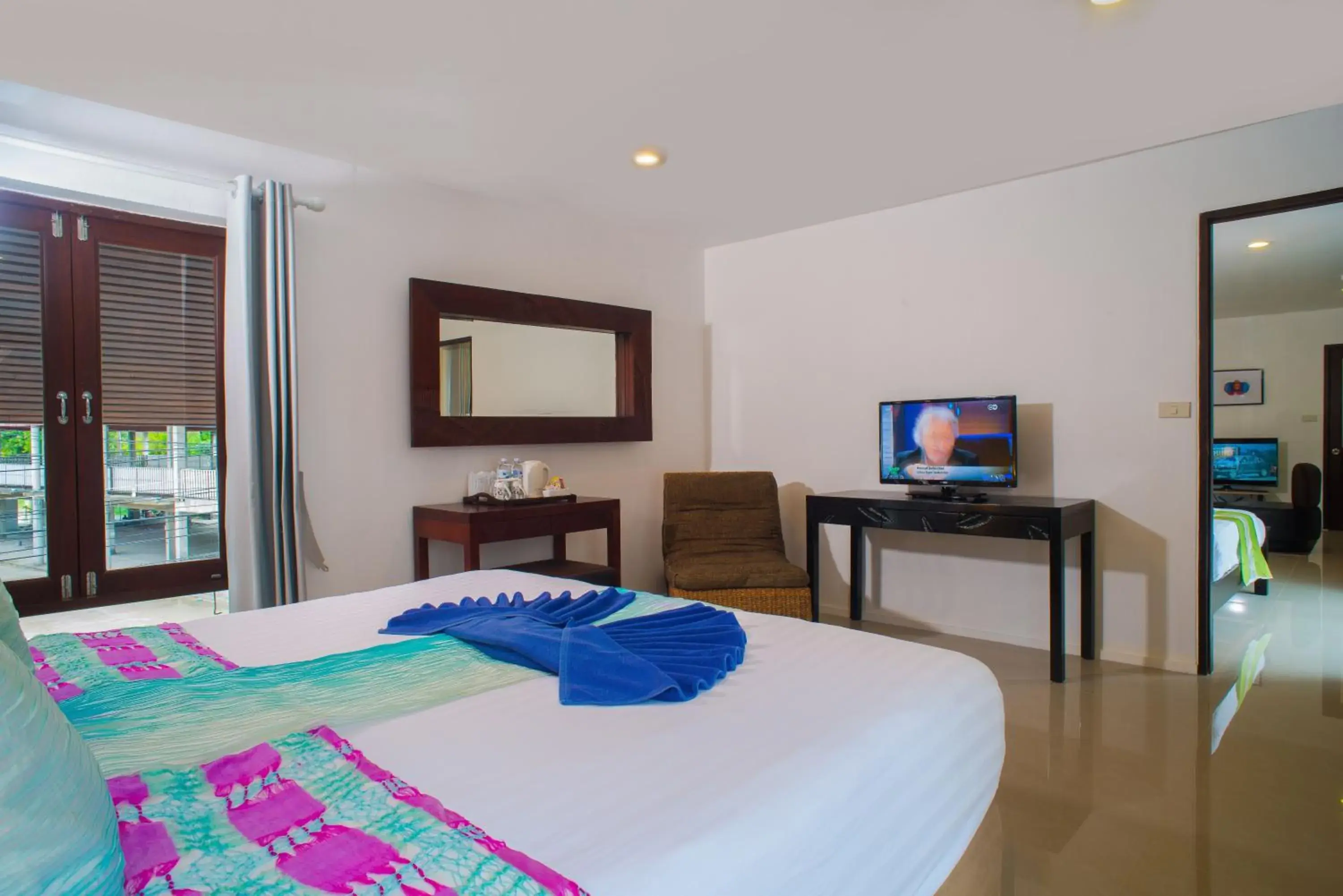 Photo of the whole room, TV/Entertainment Center in Baan Bophut Beach Hotel Samui - SHA Extra Plus